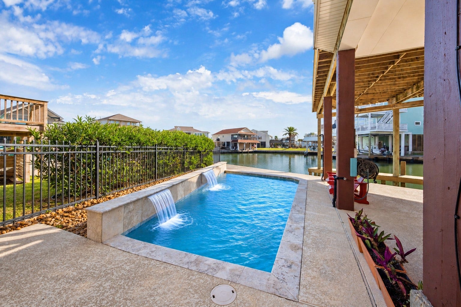 107 Bamaku Bend, Tiki Island, TX 77554 Your private pool with cascading waterfalls brings a resort-like touch. Perfect for cooling off, having fun and making memories with family and friends.
