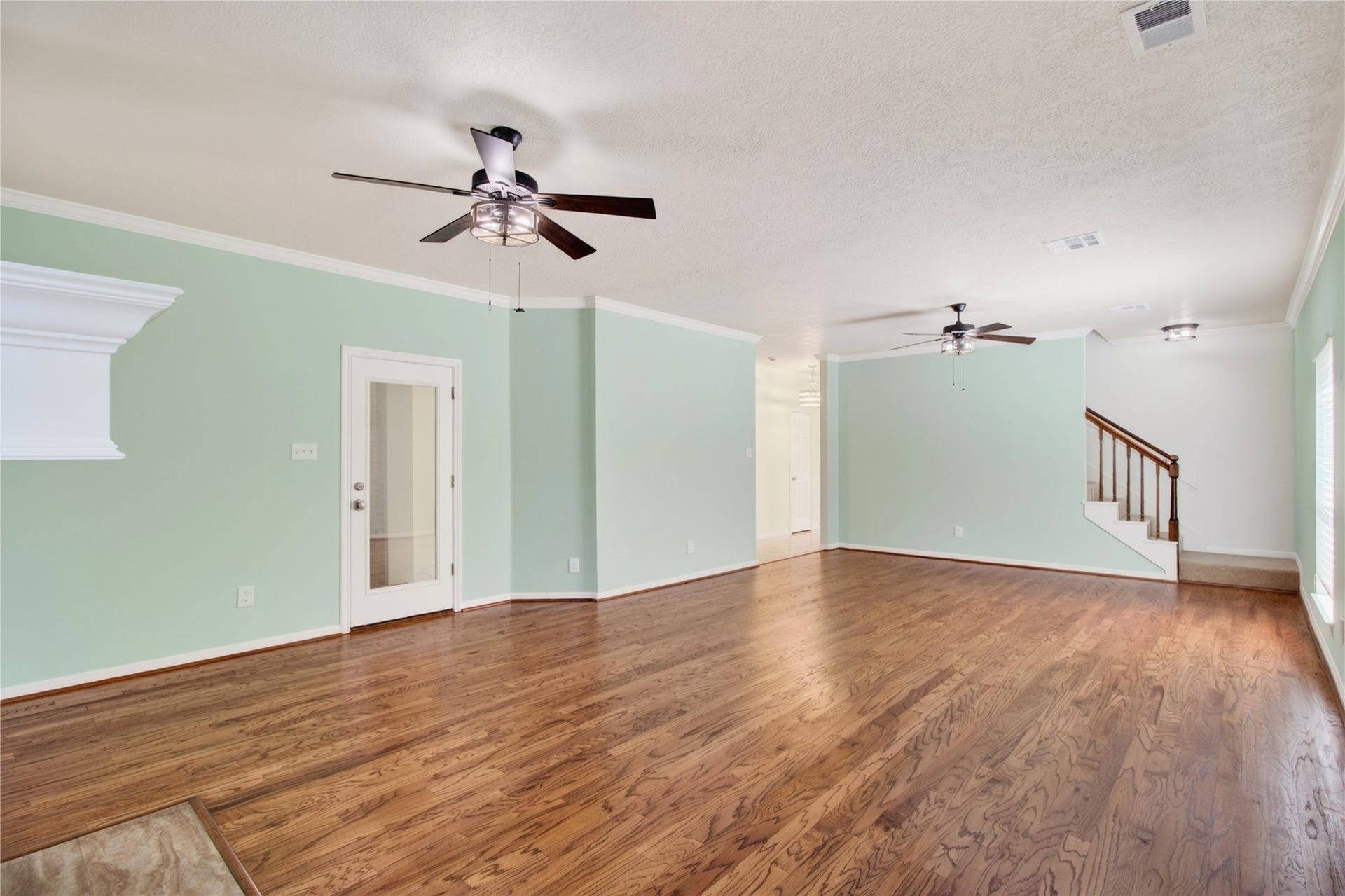 54 S Wind Drive, Montgomery, TX 77356 This is a view from the fireplace back toward the stairway leading upstairs.