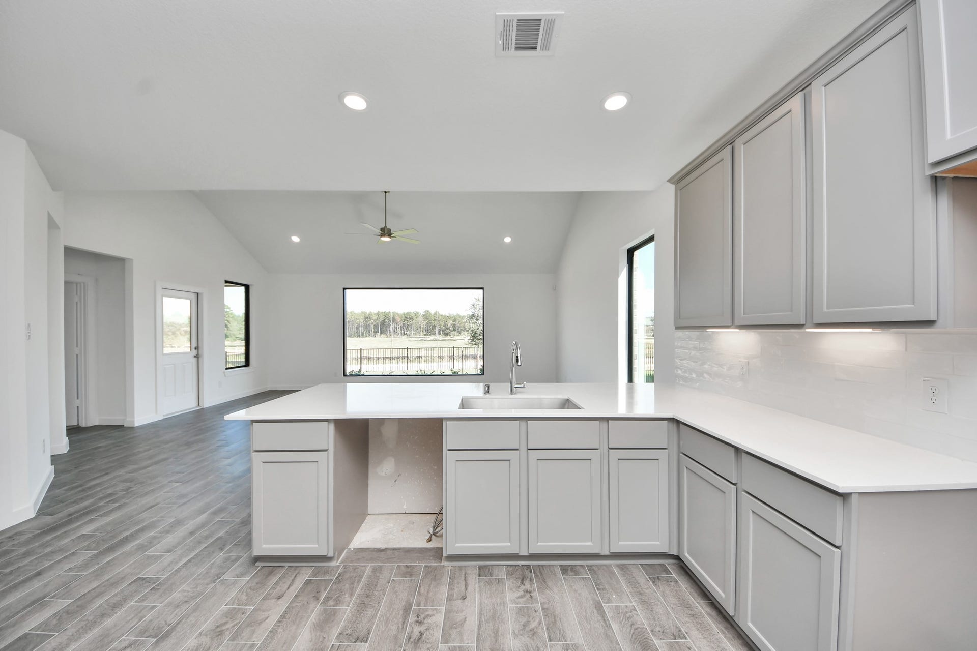 This generously spacious kitchen is a dream realized! Sample photo of completed home with similar floor plan. Actual colors and selections may vary.