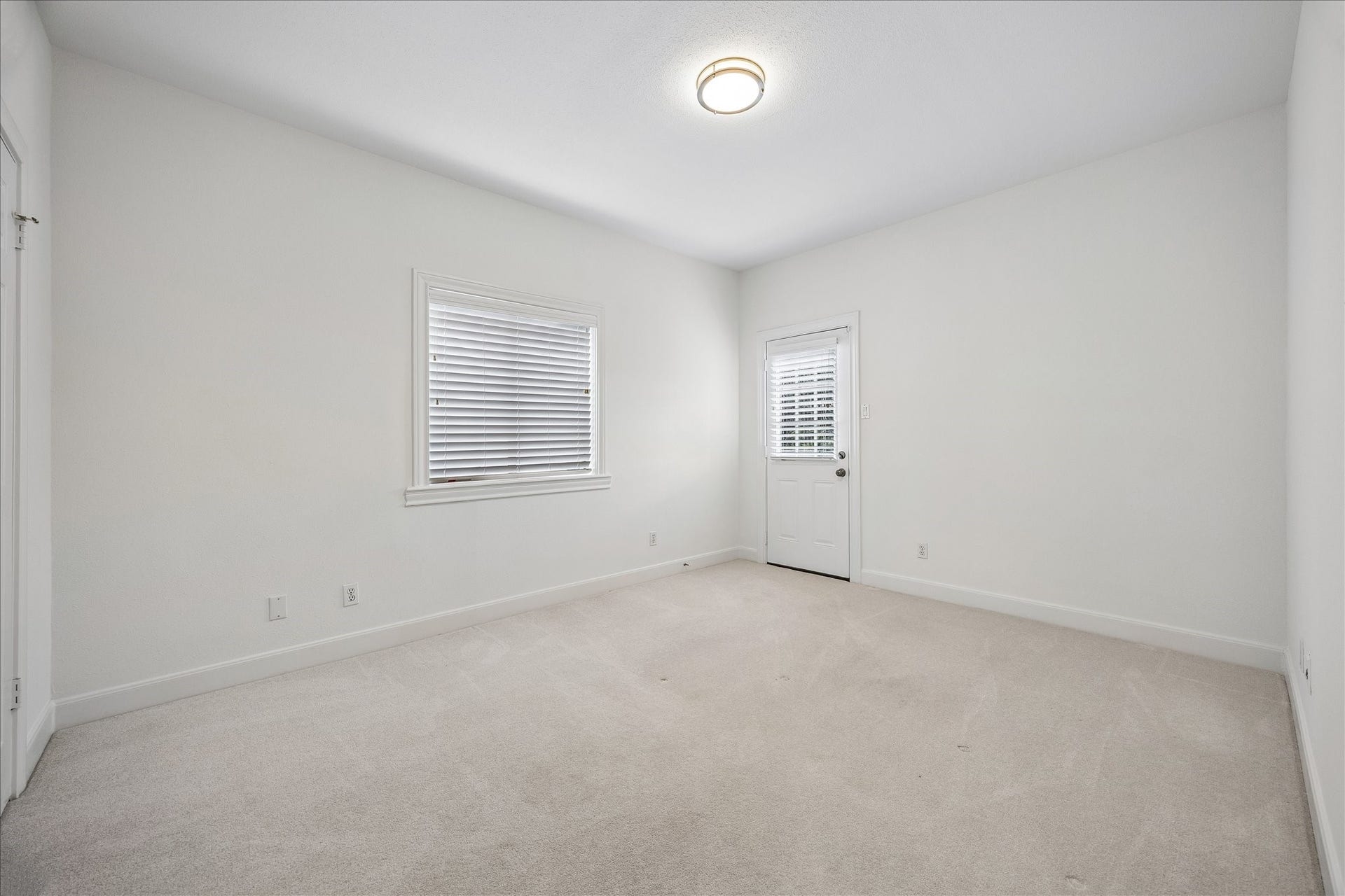 2214 Nantucket Drive, #D, Houston, TX 77057 Another view of Primary bedroom with door to hardscape patio.