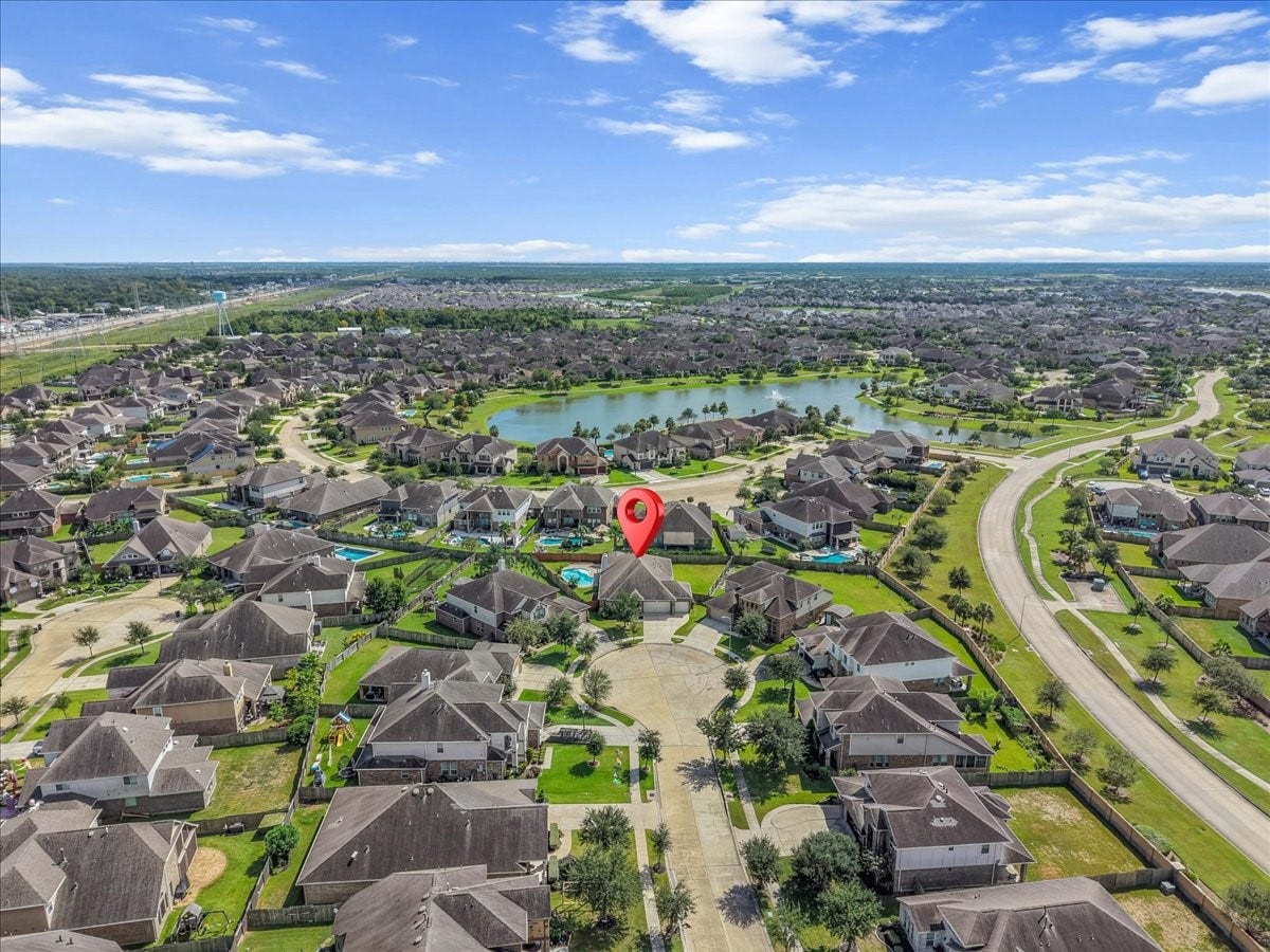 Ariel view of Mar Bella with 2314 Tobarra Lane pinned with the red tag showing your location in this fabulous master plan community