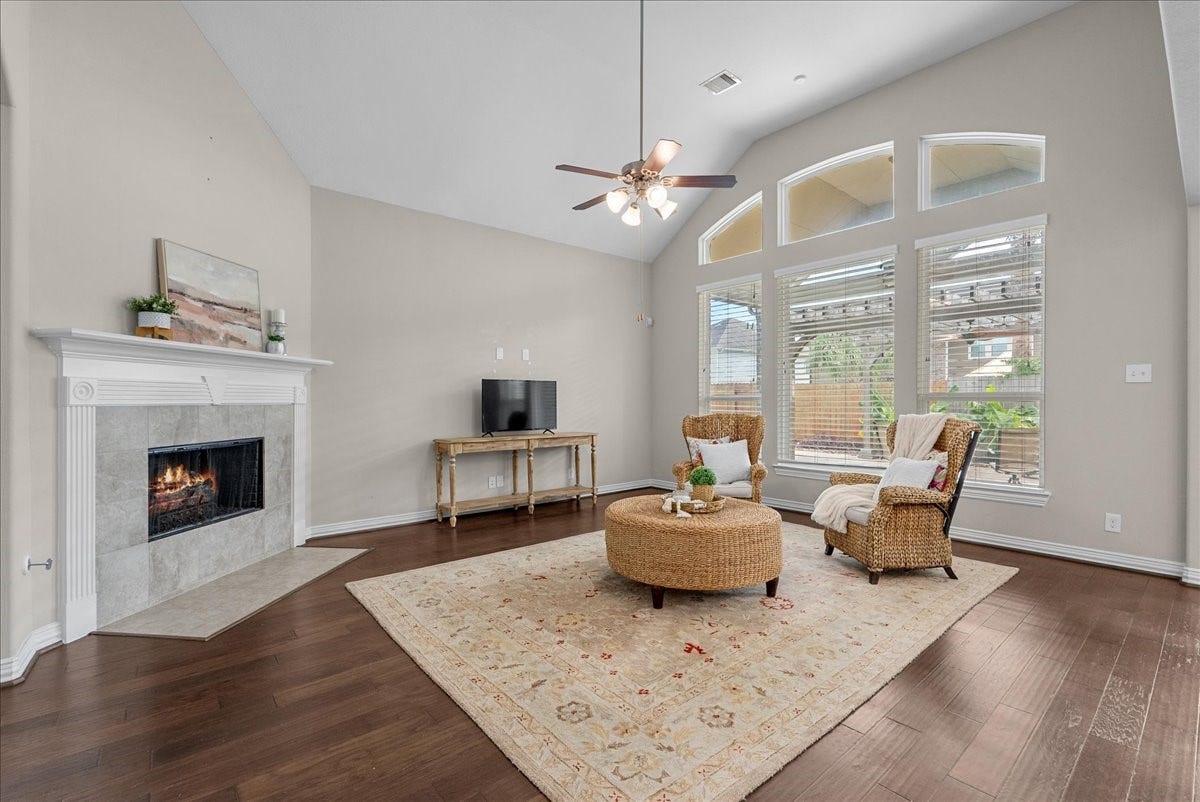 A cozy fireplace and large windows that fill the space with natural light.
So many options are available to you to make this area your own.