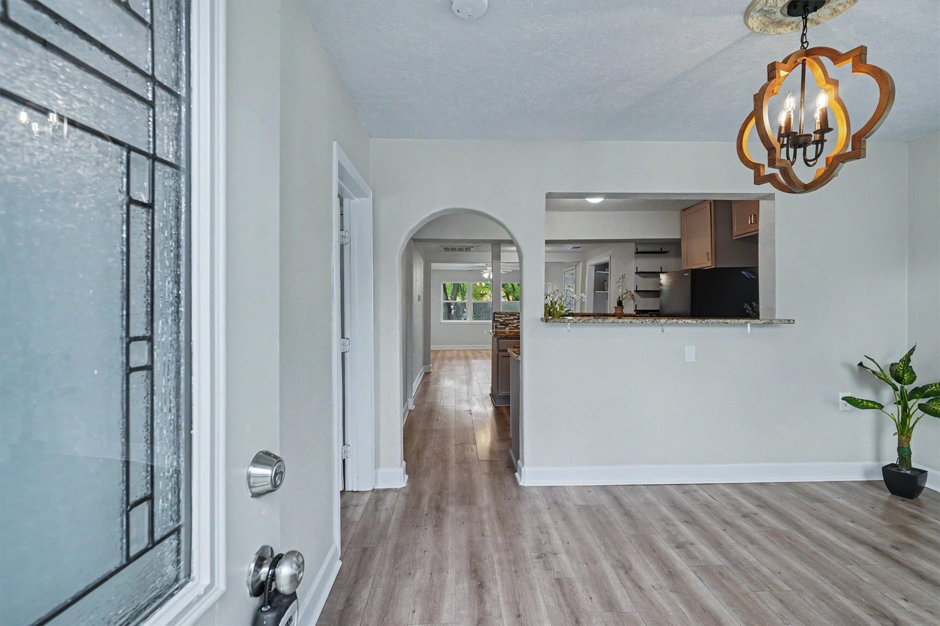 2523 7th Avenue N, Texas City, TX 77590 Flexible front room can serve as a dining area or den, with a breakfast bar opening to the kitchen.