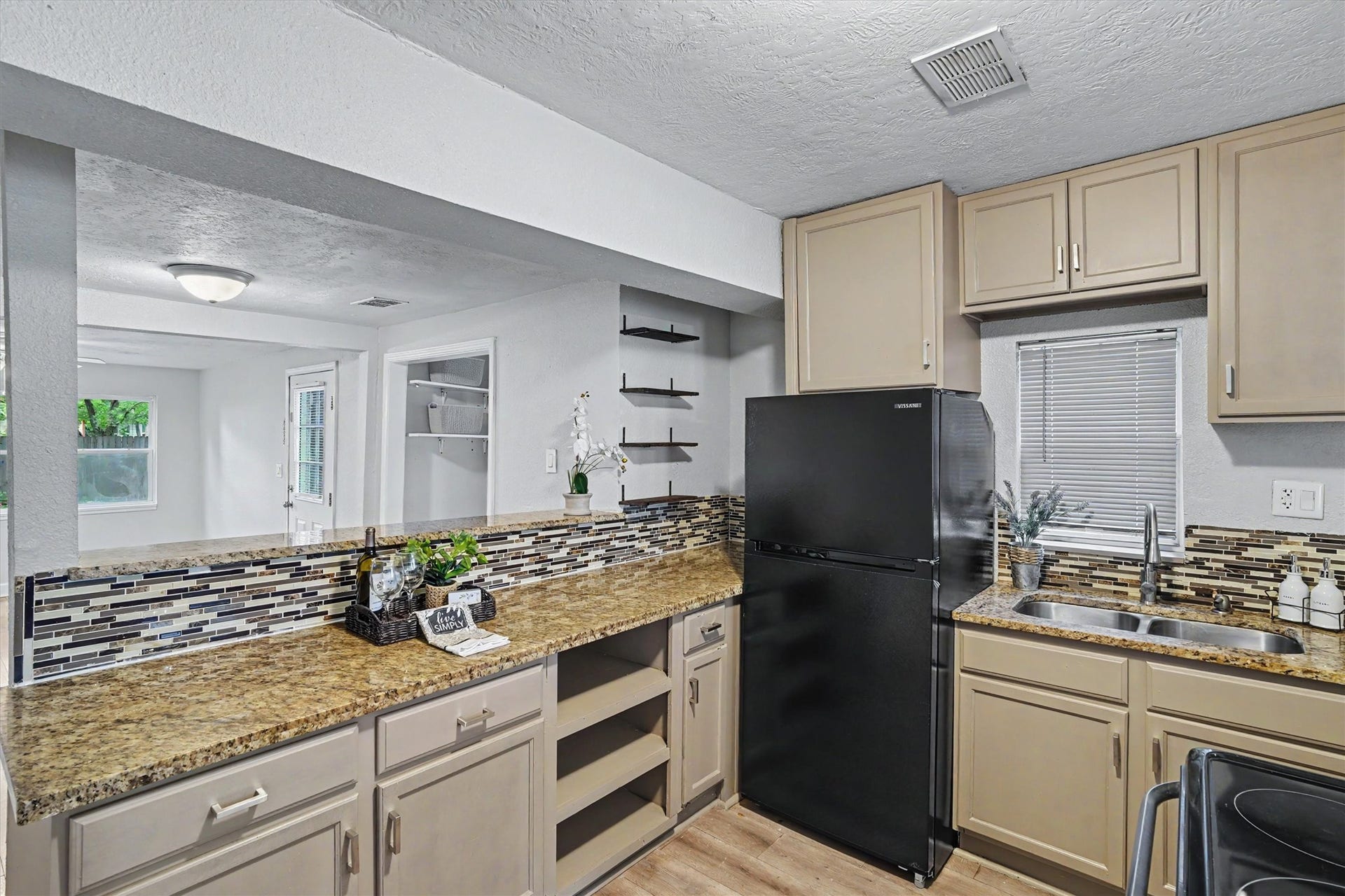 2523 7th Avenue N, Texas City, TX 77590 Plenty of counter and cabinet space, plus a new 2026 refrigerator that stays with the home.