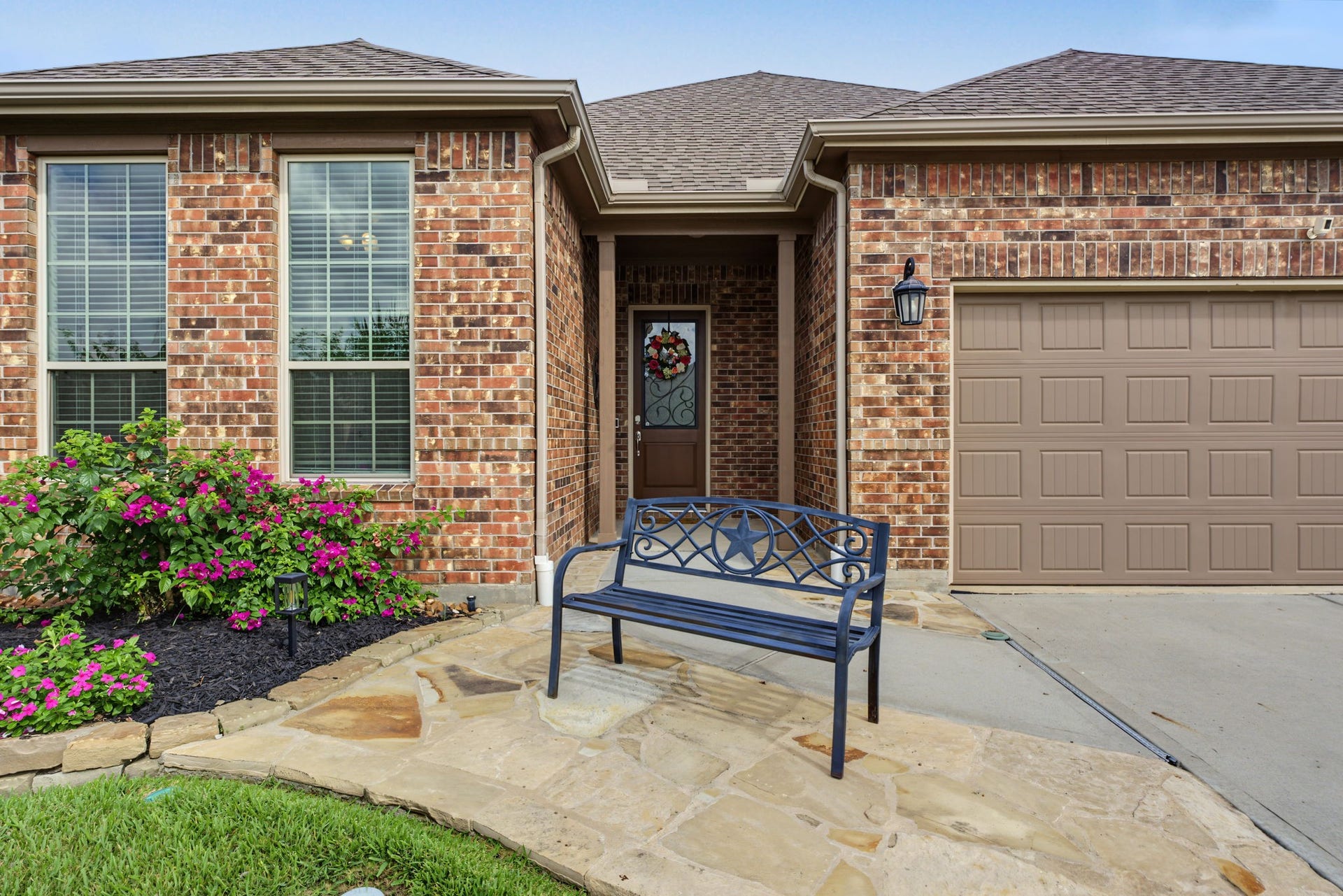 Stunning stone enhancements along the driveway