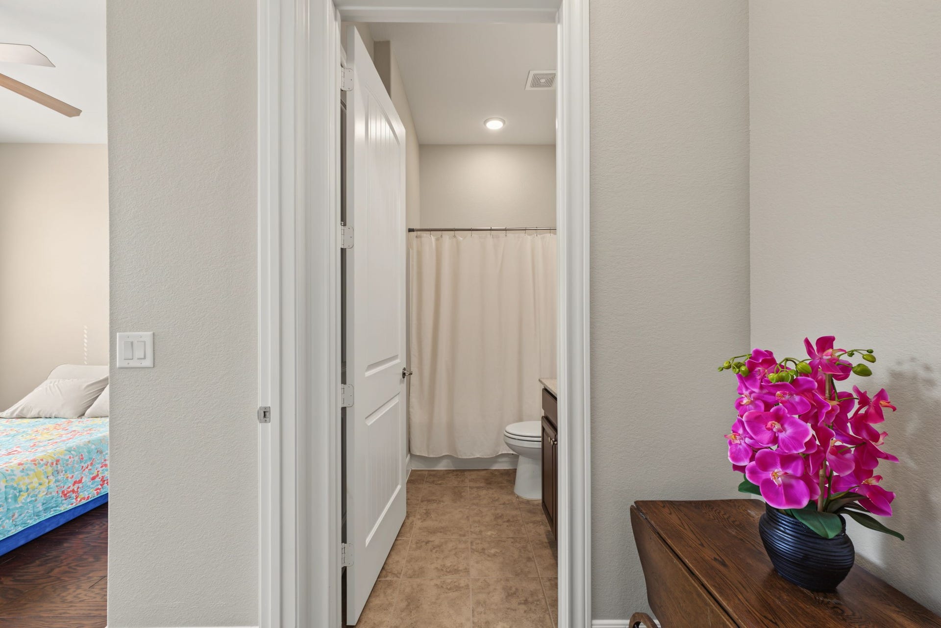 The secondary bathroom is next to the secondary bedroom