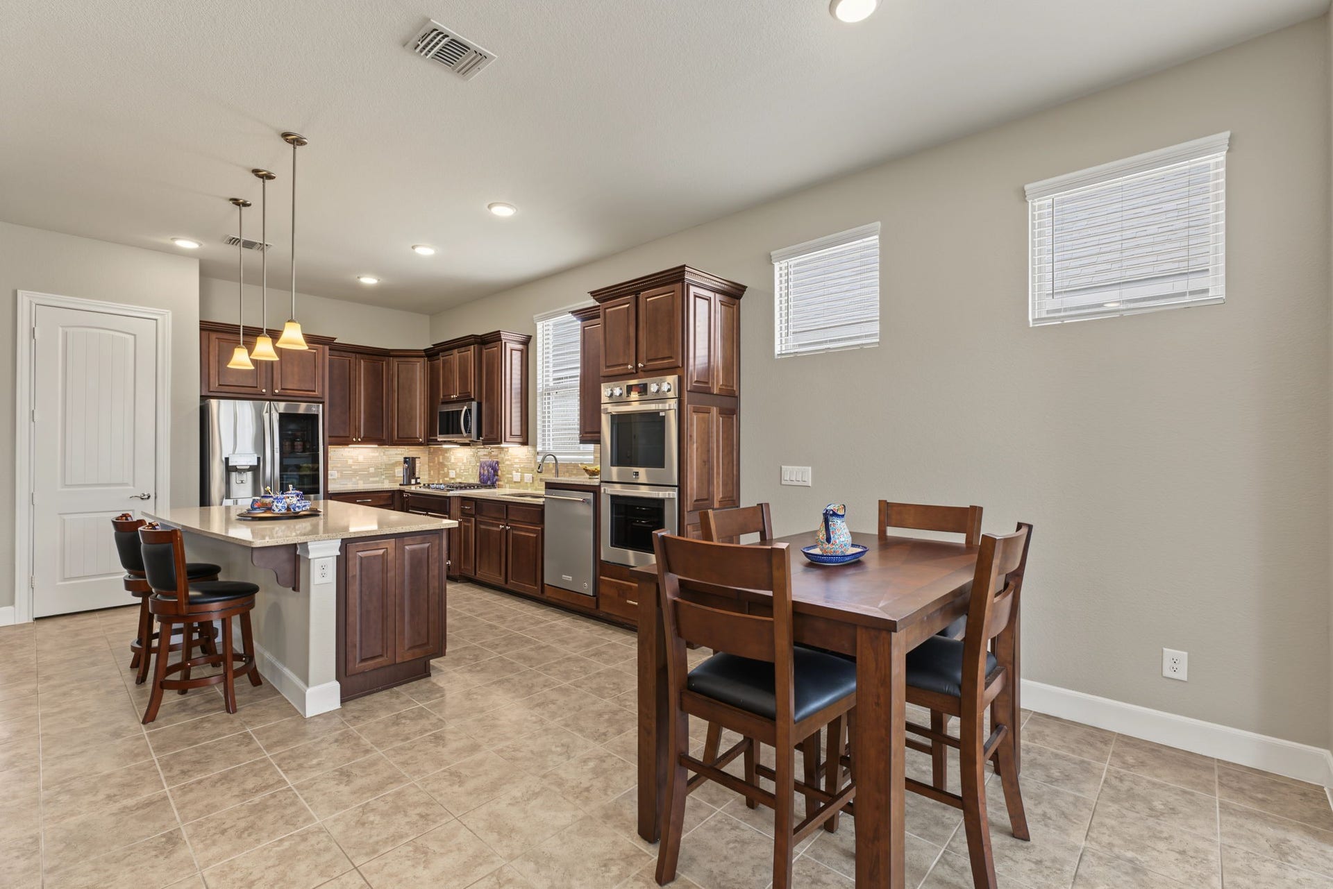 Plenty of cabinet space and microwave is above the gas cooktop