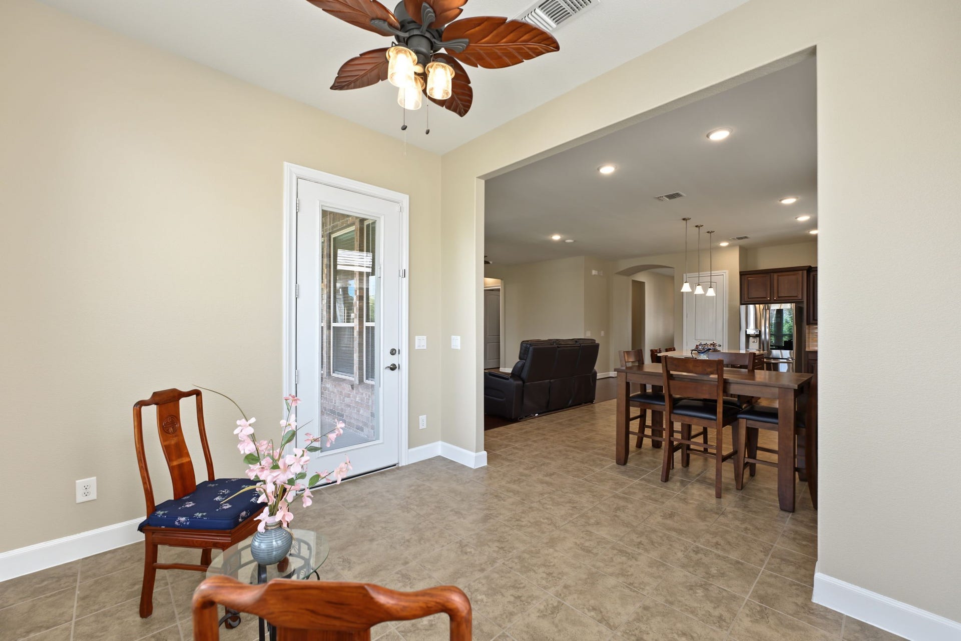 There is a door from the sunroom leading to the screened in patio