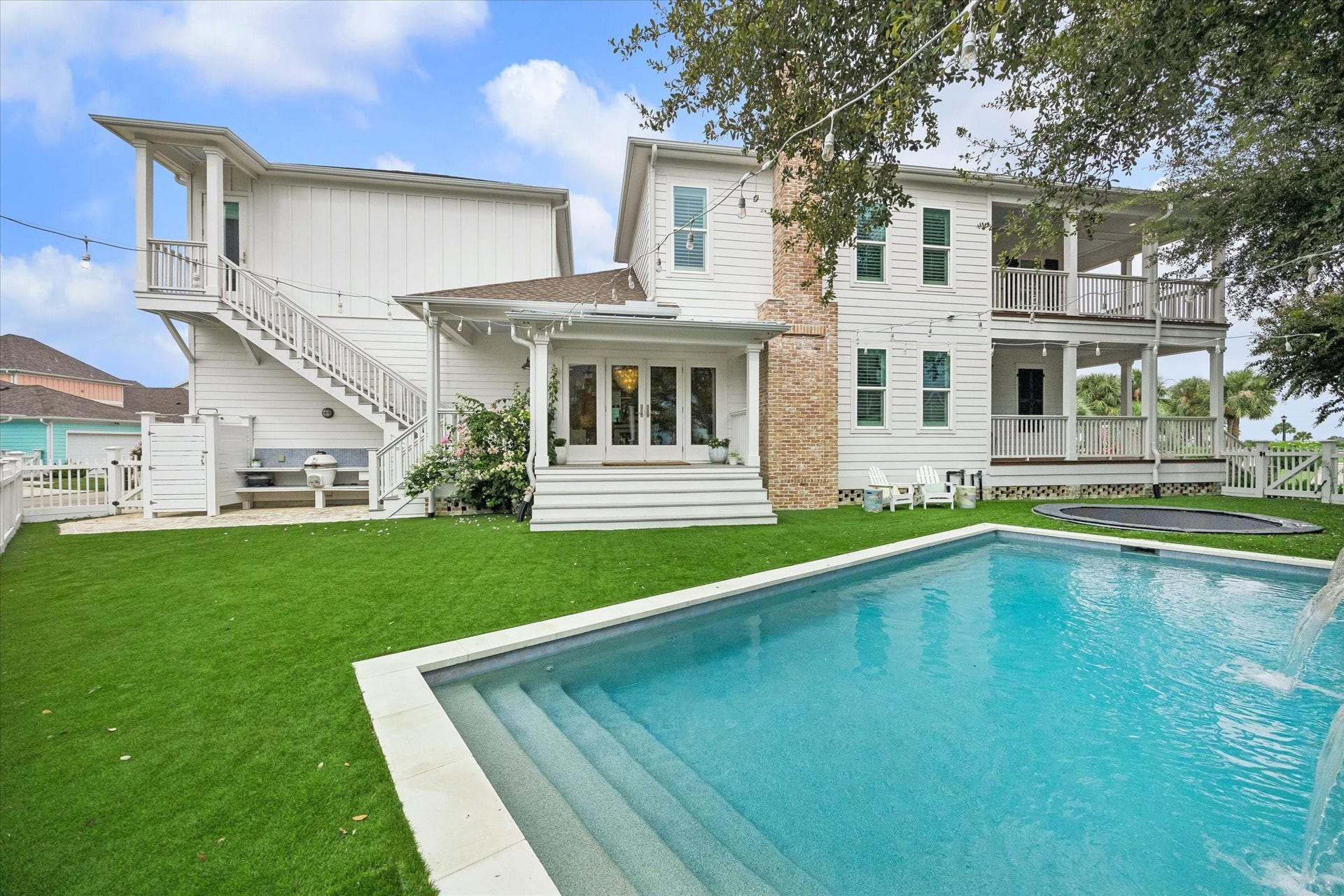 7 Curiosity Lane, Galveston, TX 77554 Beautiful residence. with all the amenities you could need. Pool, Generator, outdoor kitchen, fireplace etc..