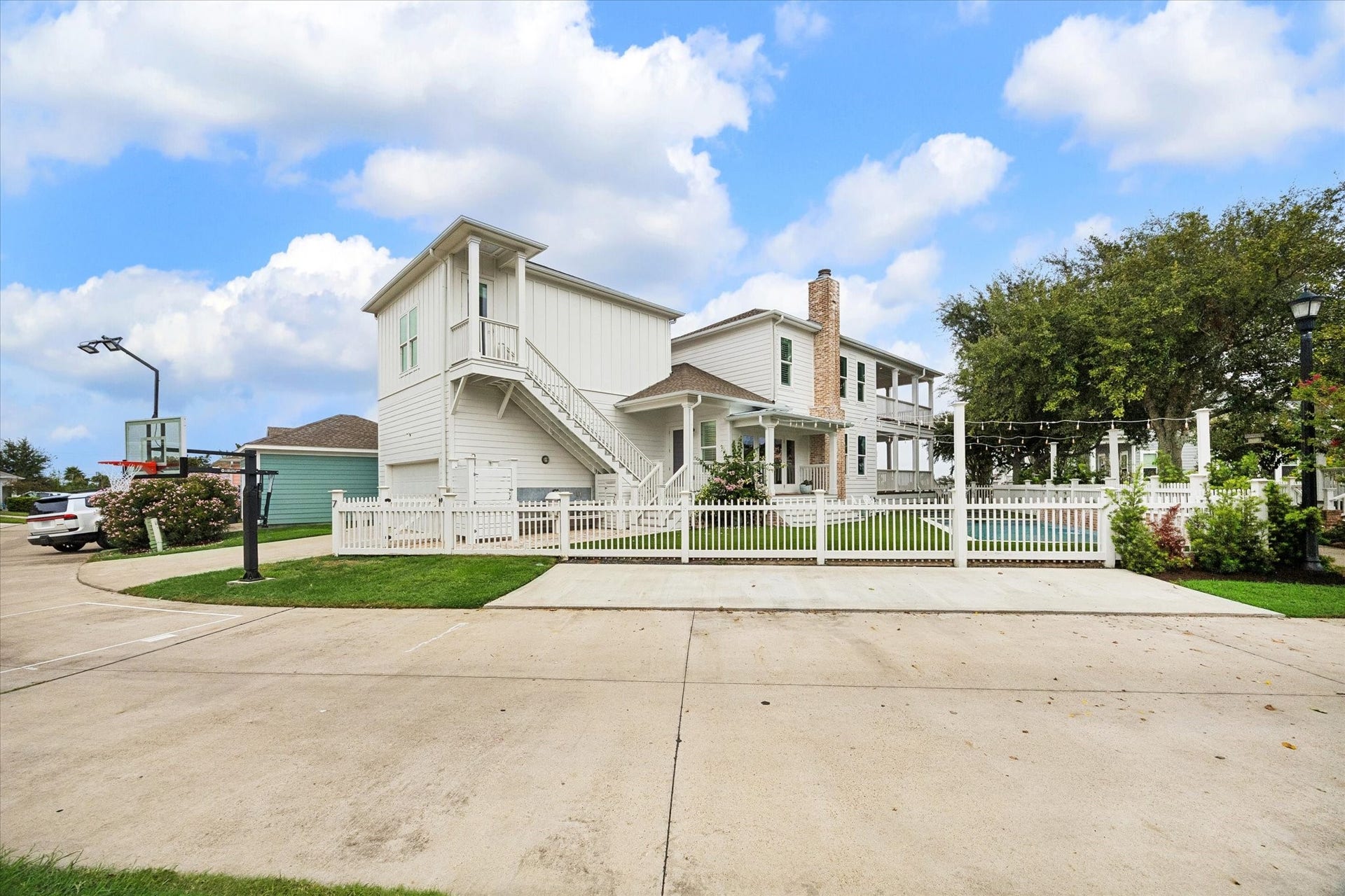 7 Curiosity Lane, Galveston, TX 77554 Back of home view. Designed by Creole Designs.
