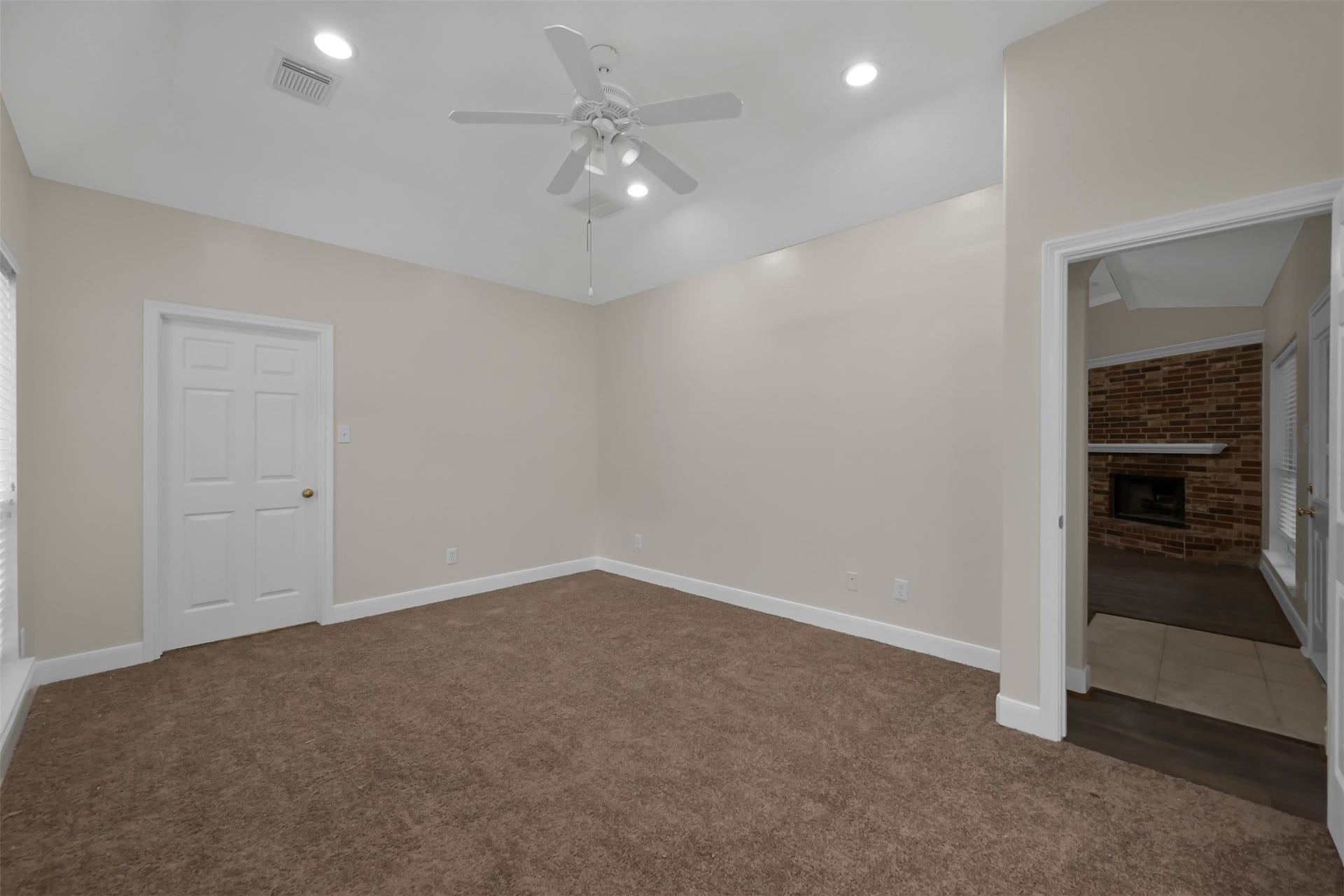 13425 Hidden Valley Drive, Montgomery, TX 77356 Primary Bedroom looking at the walk in closet and the Living room.