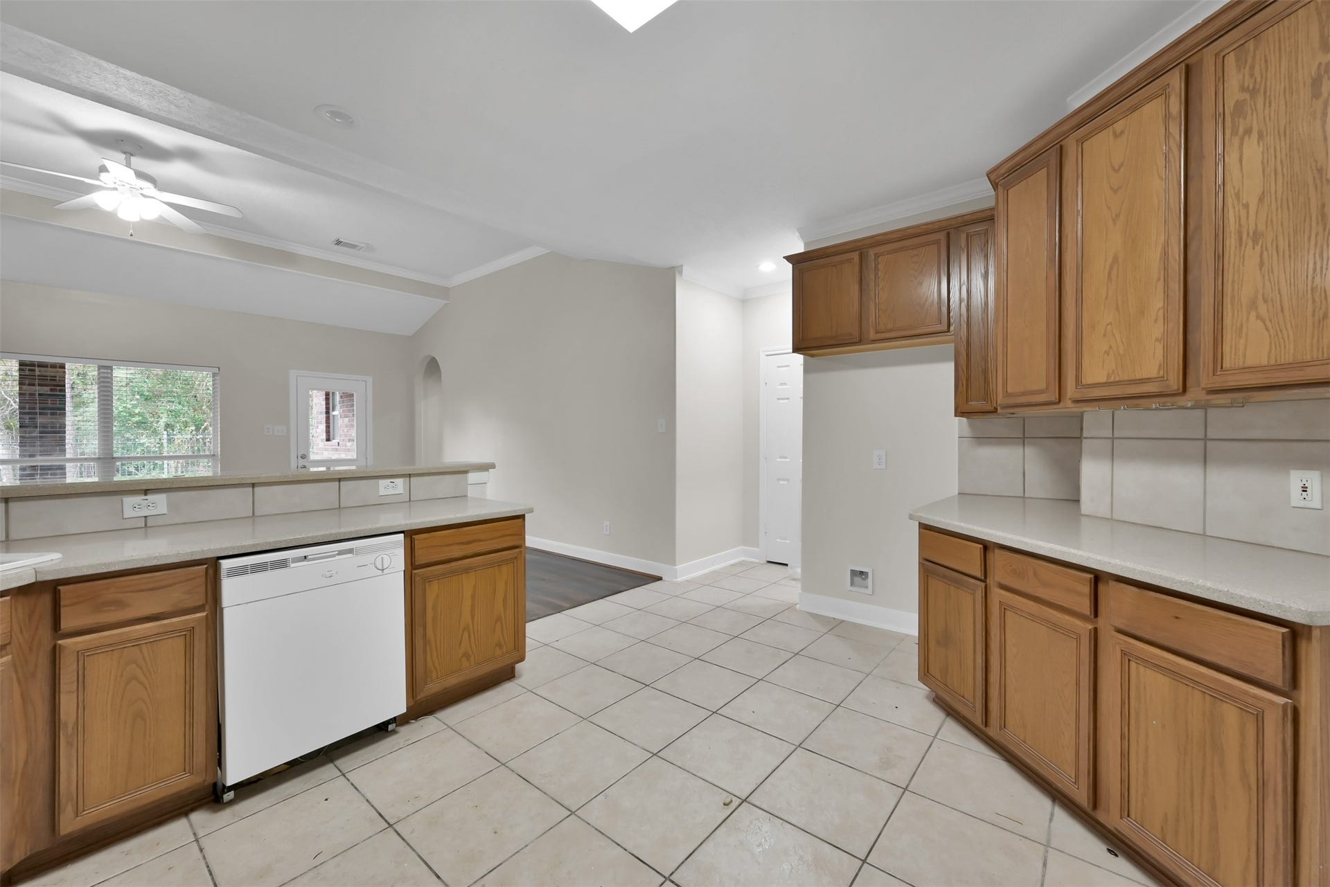 13425 Hidden Valley Drive, Montgomery, TX 77356 Kitchen while facing the Pantry and entrance to the Laundry room.