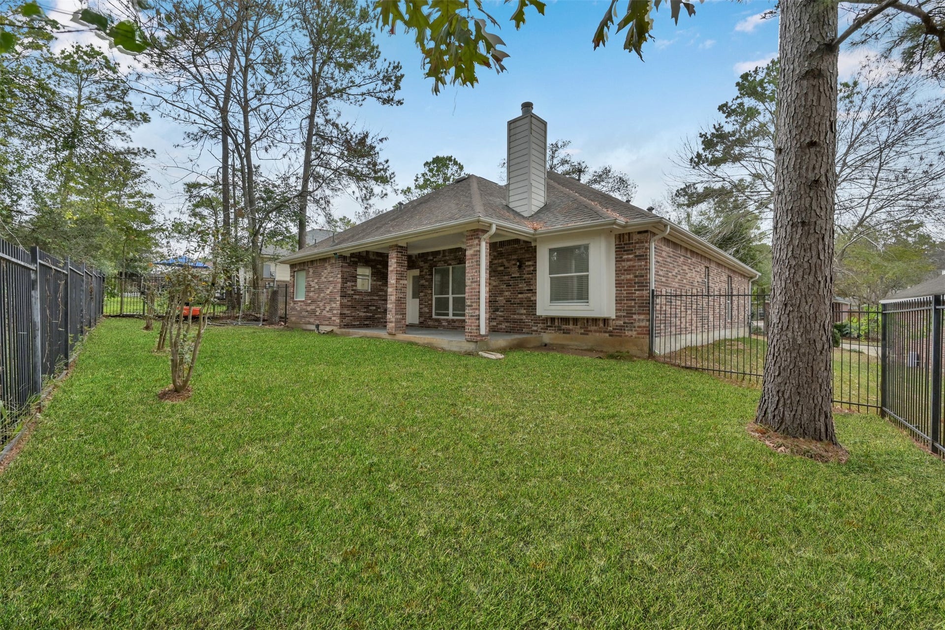 13425 Hidden Valley Drive, Montgomery, TX 77356 Back yard. Right/ middle side.