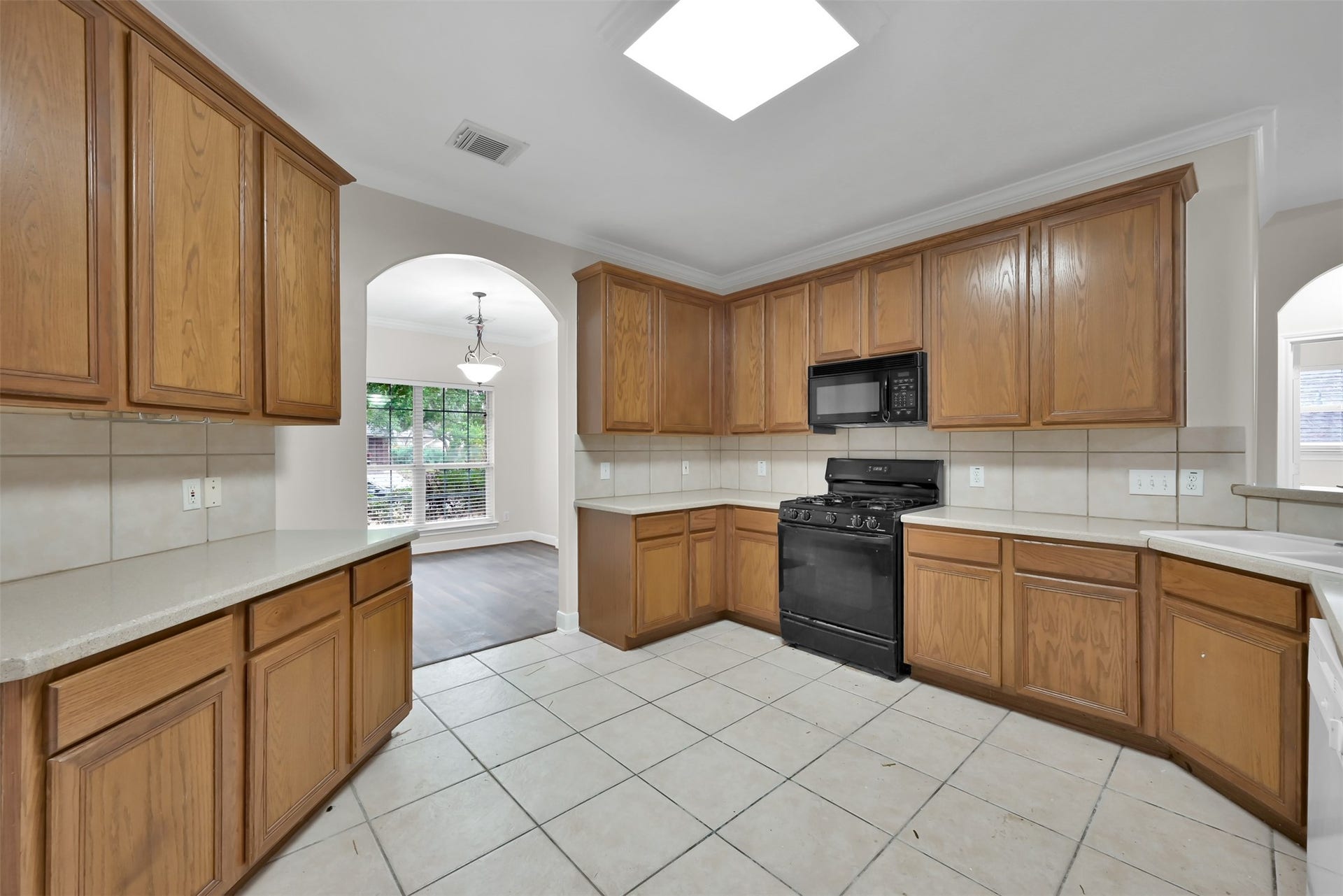 13425 Hidden Valley Drive, Montgomery, TX 77356 Kitchen looking into the Dining room.