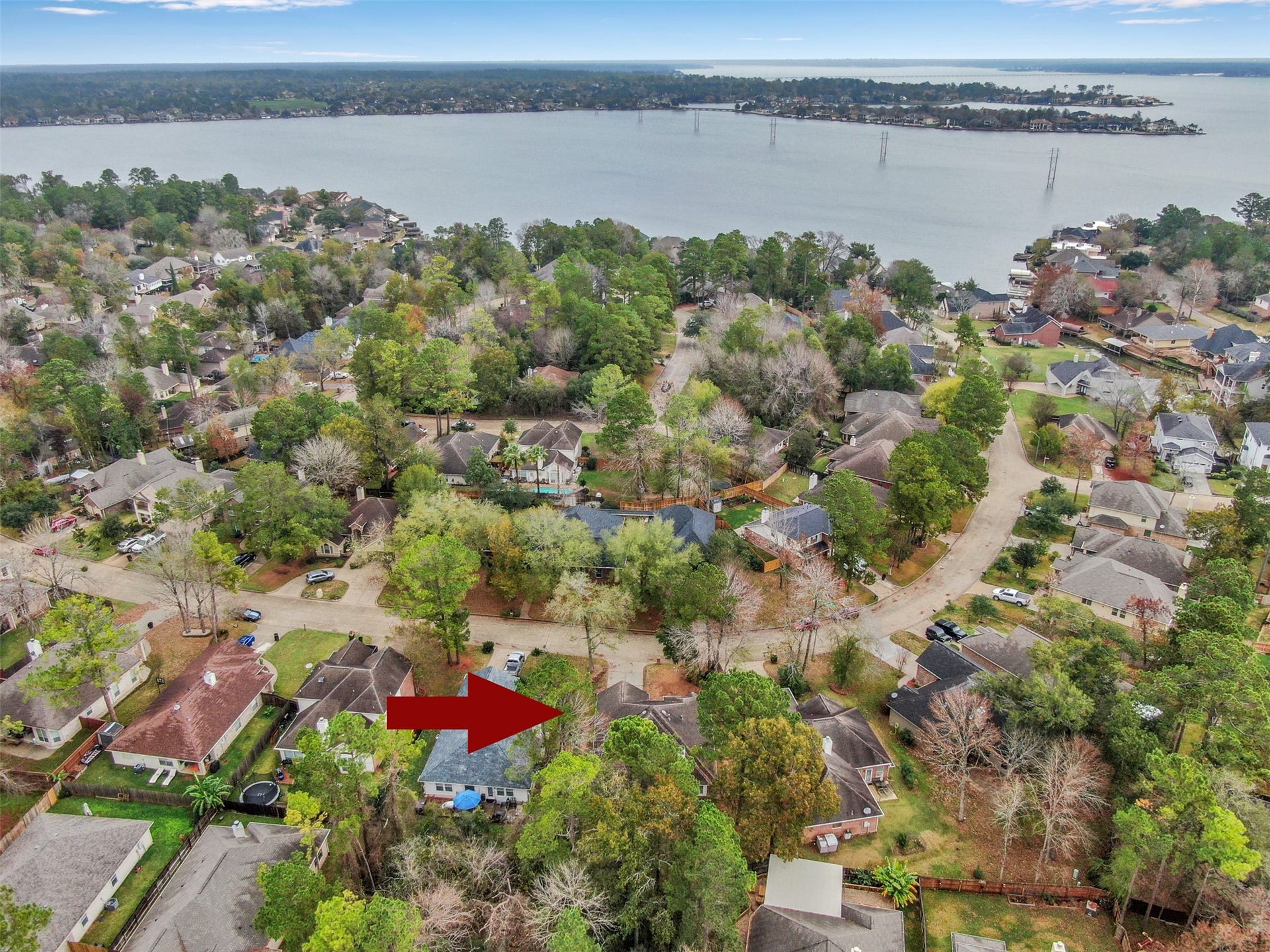 13425 Hidden Valley Drive, Montgomery, TX 77356 Aerial of the house and Lake Conroe.