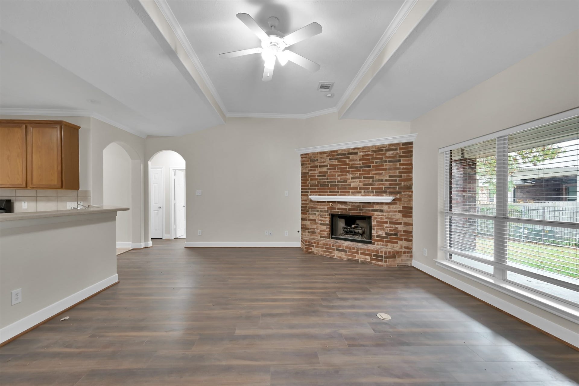 13425 Hidden Valley Drive, Montgomery, TX 77356 Living room with kitchen to your left. and 2 bedrooms and a bath straight ahead.