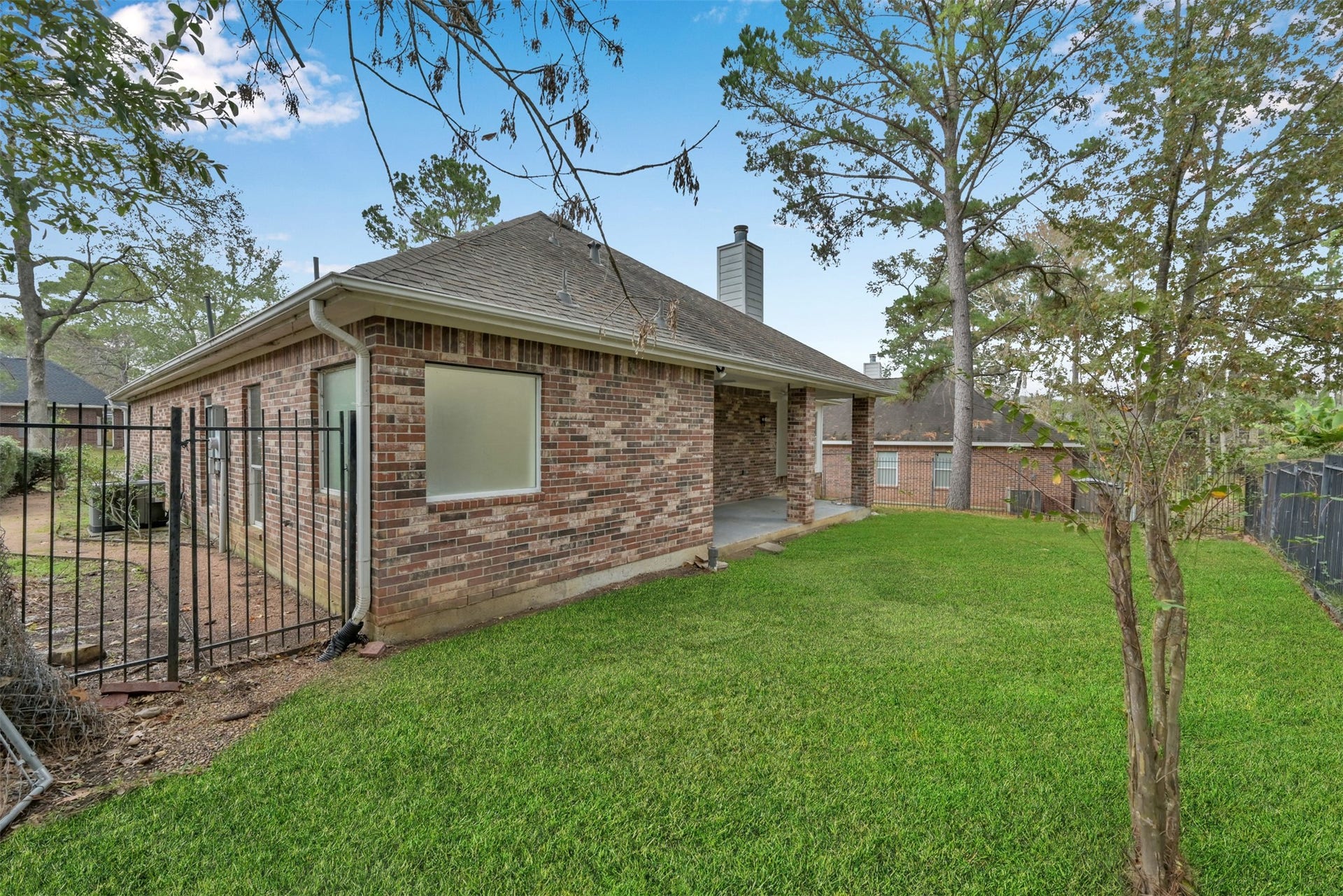 13425 Hidden Valley Drive, Montgomery, TX 77356 Back yard. Left side.
