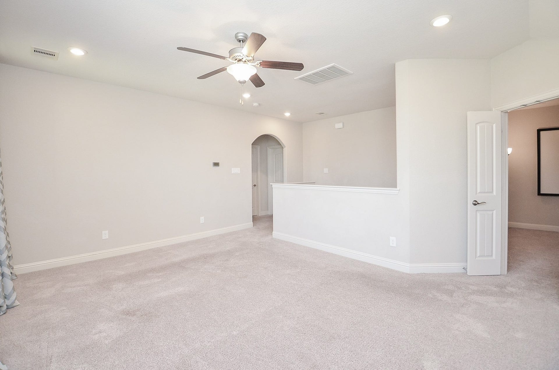 18438 Panton Terrace Lane, Cypress, TX 77429 Spacious upstairs gameroom, perfect for use as a dedicated kids' playroom or a versatile entertainment space for guests!