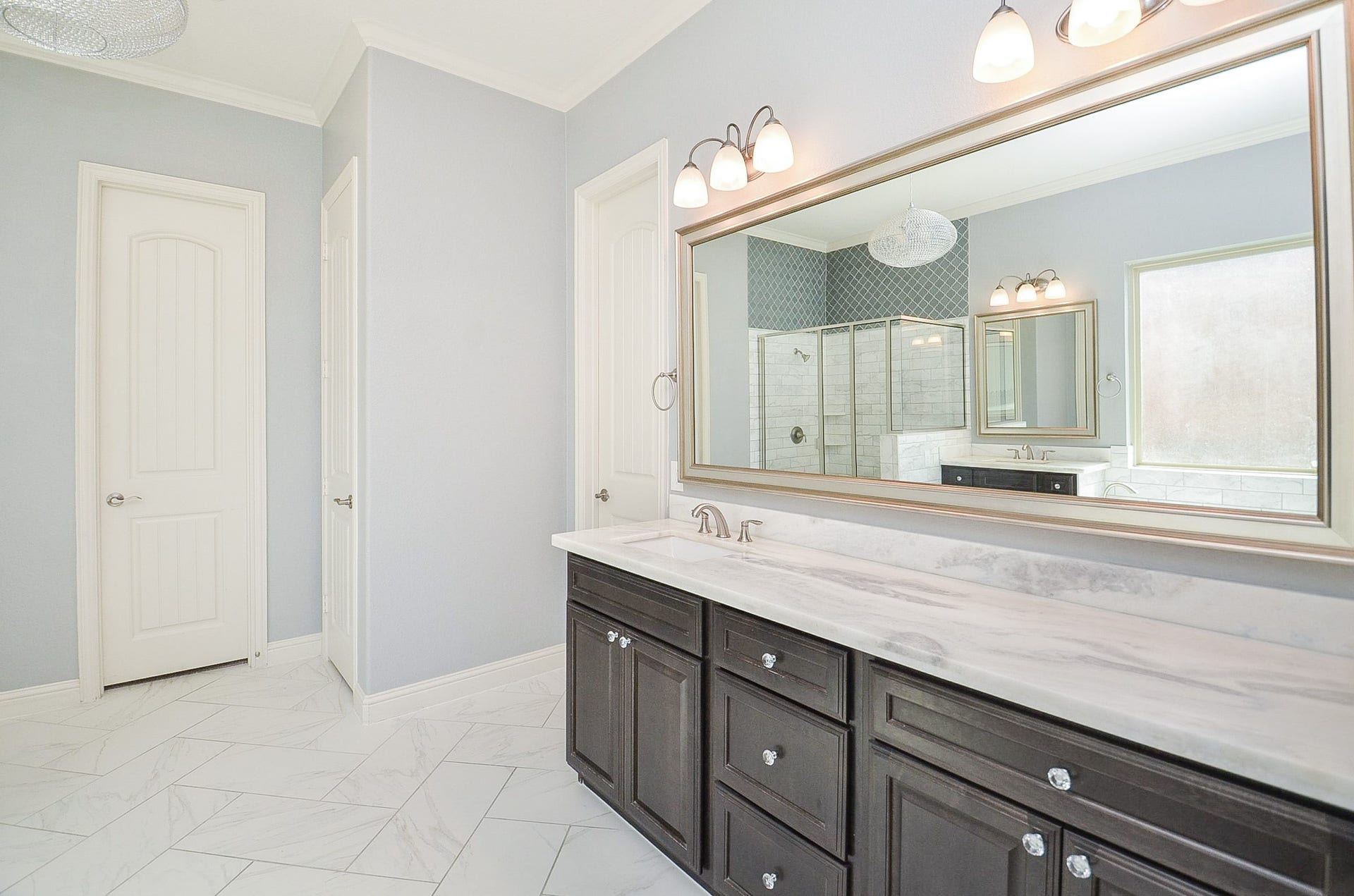 18438 Panton Terrace Lane, Cypress, TX 77429 Double vanity with custom cabinetry in the primary bathroom!