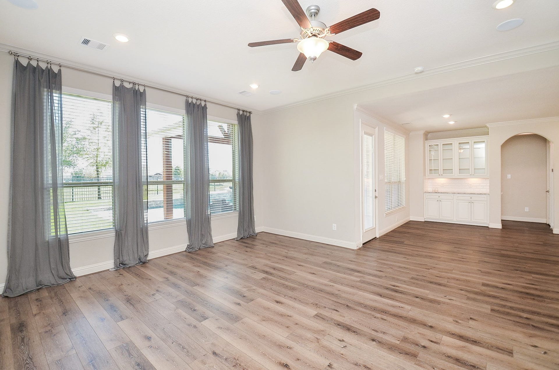 18438 Panton Terrace Lane, Cypress, TX 77429 This property features an inviting open floor plan with a breakfast bar that flows seamlessly into the living room!