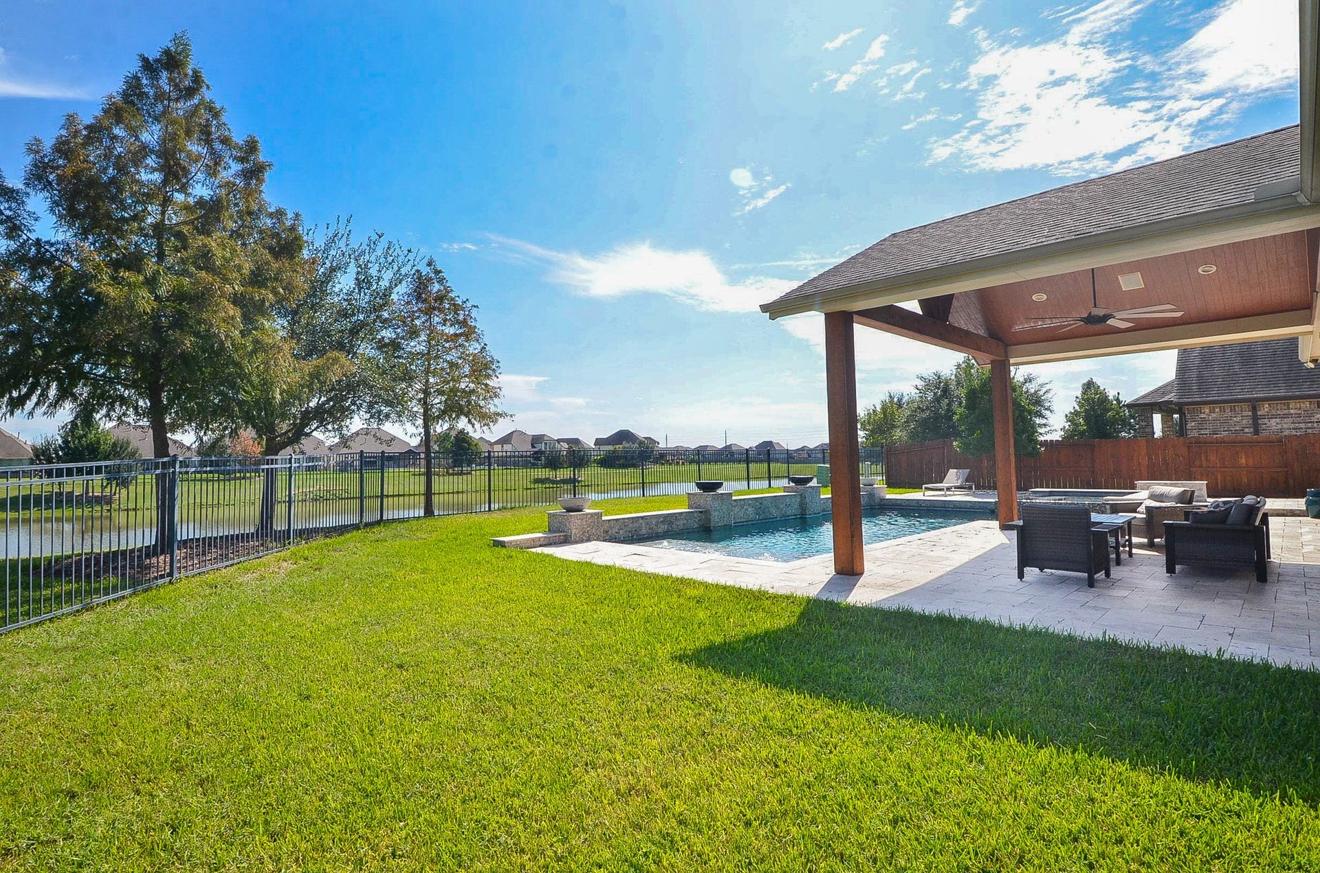18438 Panton Terrace Lane, Cypress, TX 77429 This spacious backyard features expansive green space, perfect for outdoor recreation and family gatherings!