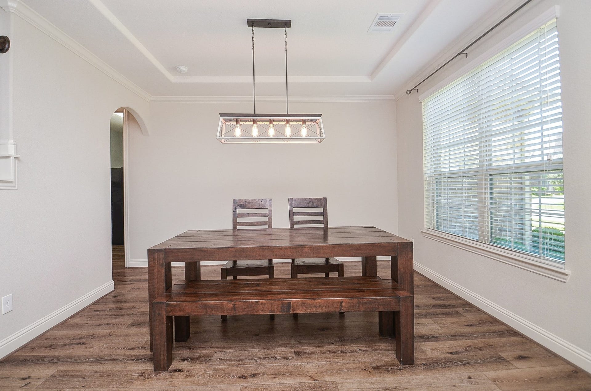 18438 Panton Terrace Lane, Cypress, TX 77429 Beautiful dining area upon entry featuring a large window and an upgraded light fixture!