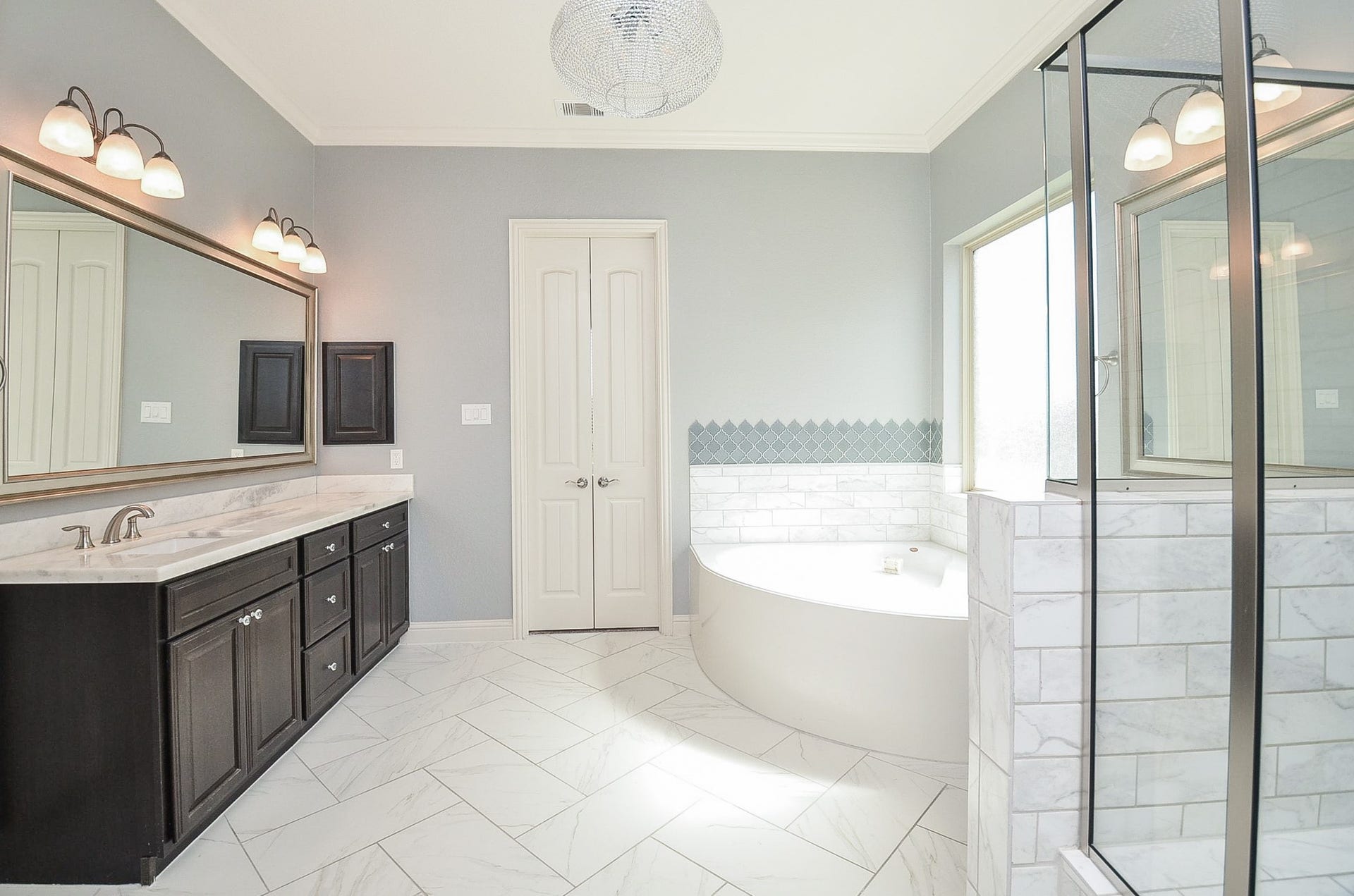 18438 Panton Terrace Lane, Cypress, TX 77429 Features a spacious master bathroom with a separate soaking tub and walk-in shower!