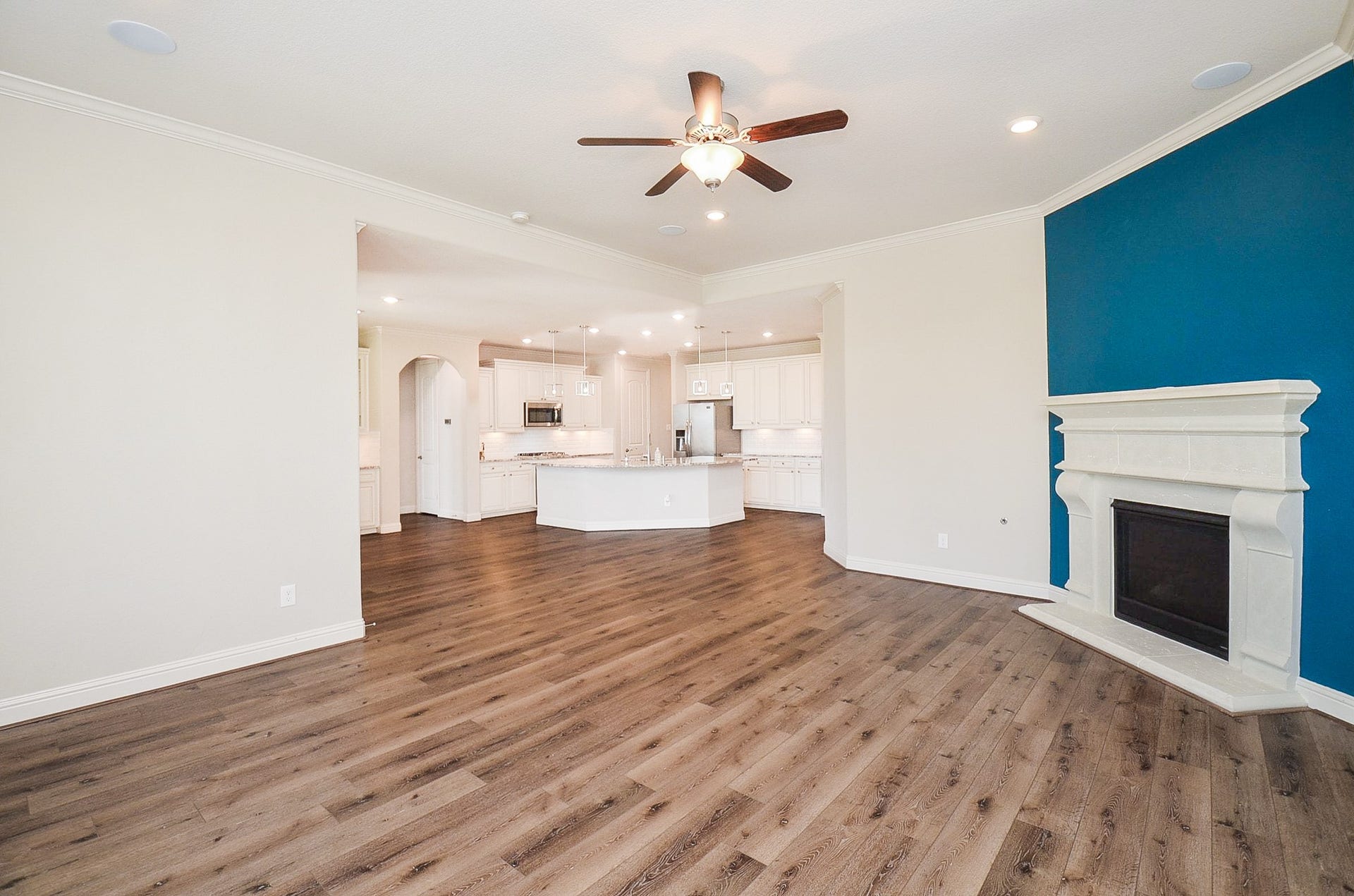 18438 Panton Terrace Lane, Cypress, TX 77429 The possibilities are limitless in this expansive living room, which features a stunning stone fireplace!