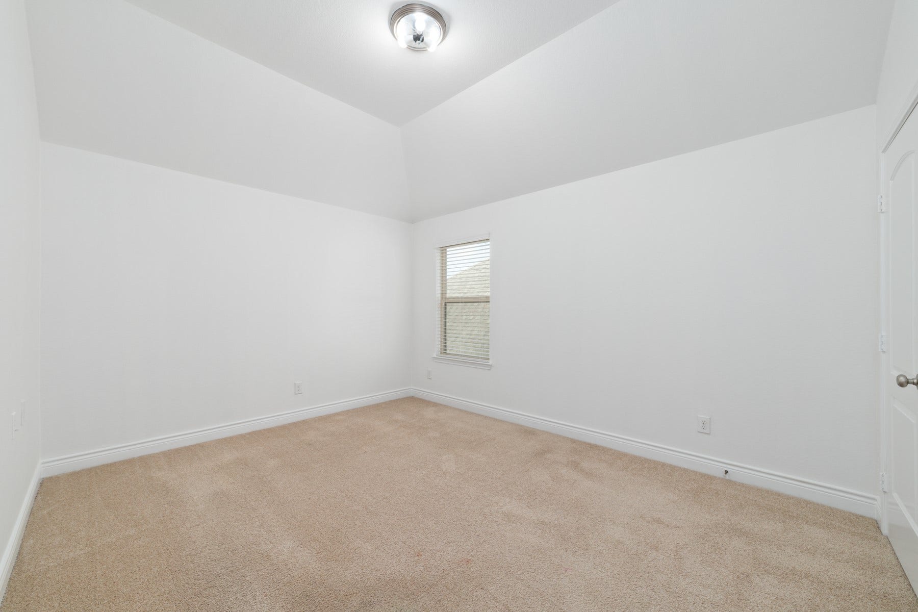 Bedroom #2 - 
Discover this inviting main-floor bedroom, one of four, offering cozy comfort.