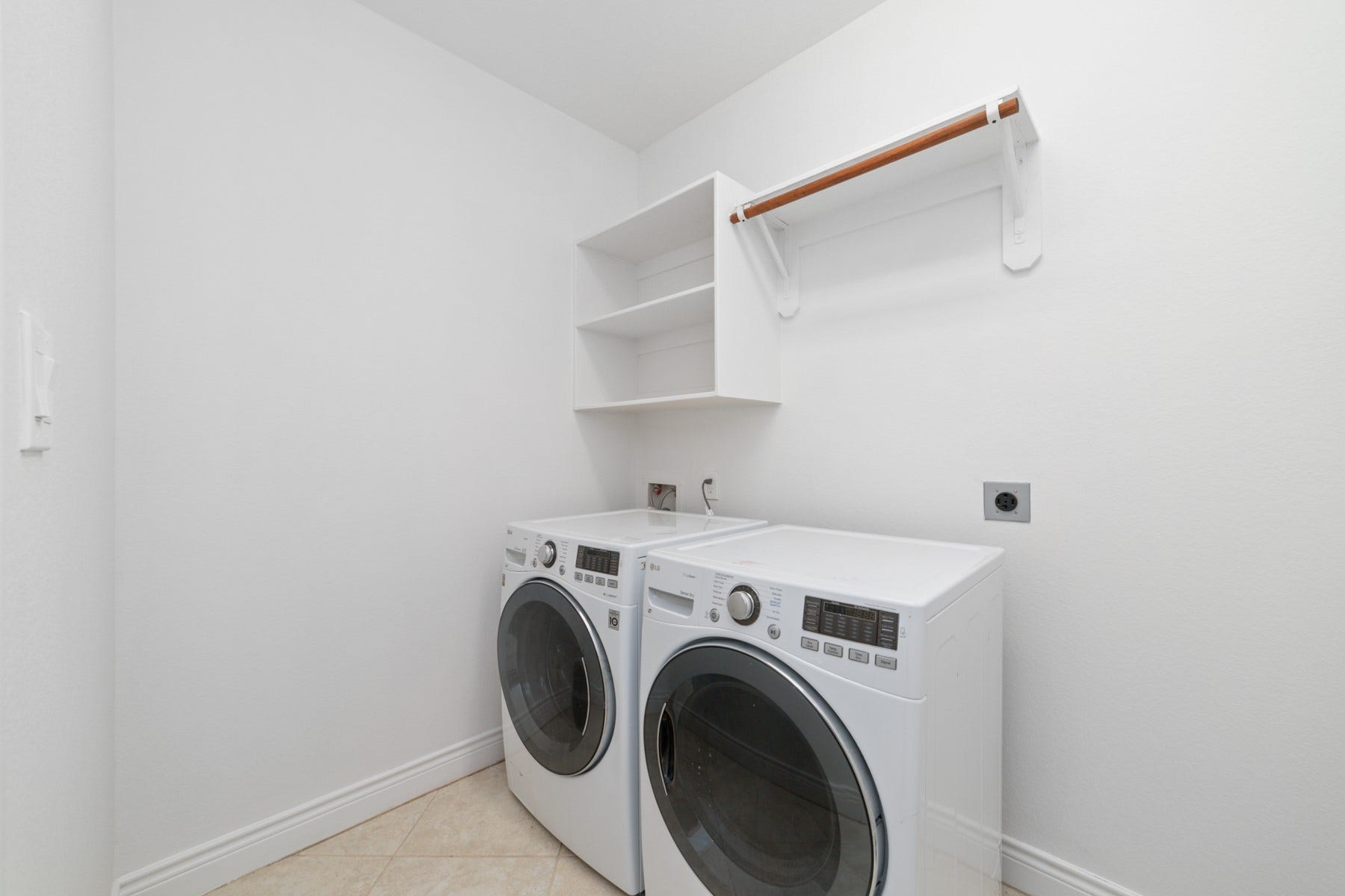Experience hassle-free living with an included front-loading washer and dryer.