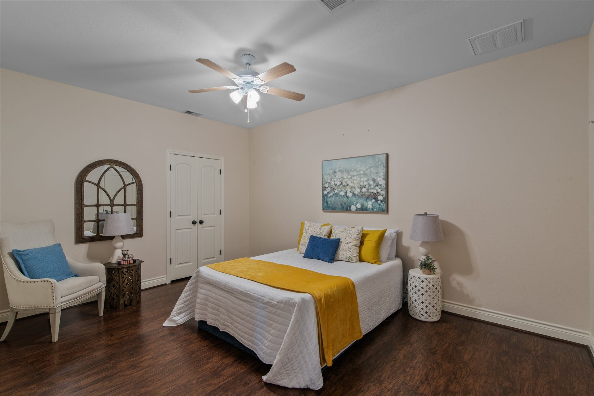 16144 Firetower Road, Conroe, TX 77306 Additional flex room with high ceilings, wood-look flooring, and two closets. Currently staged as a bedroom, this space offers versatility for hobbies, exercise, or a home office.