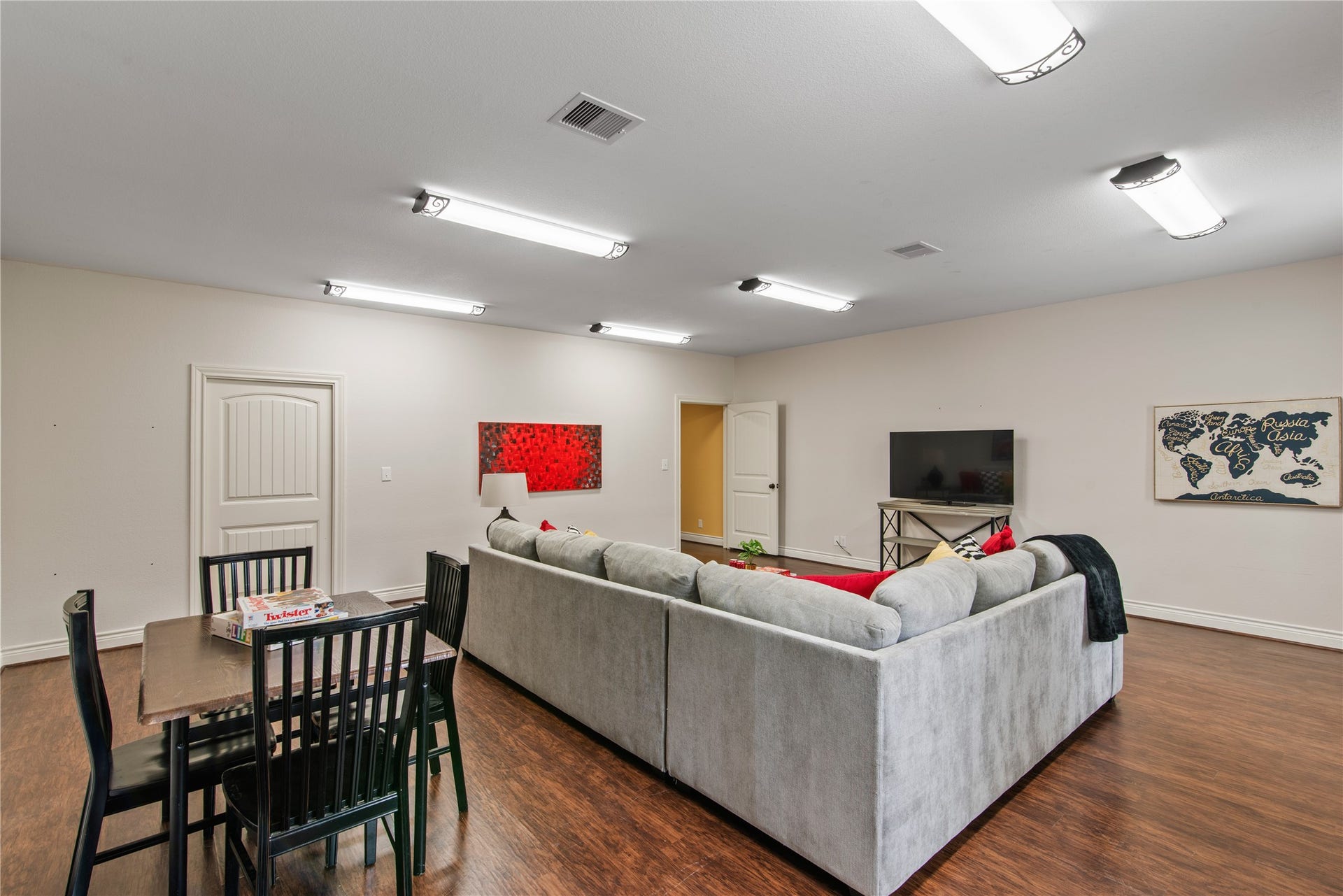 16144 Firetower Road, Conroe, TX 77306 An additional view highlights the fourth bedrooms generous proportions, with room for separate seating and game-table areas.