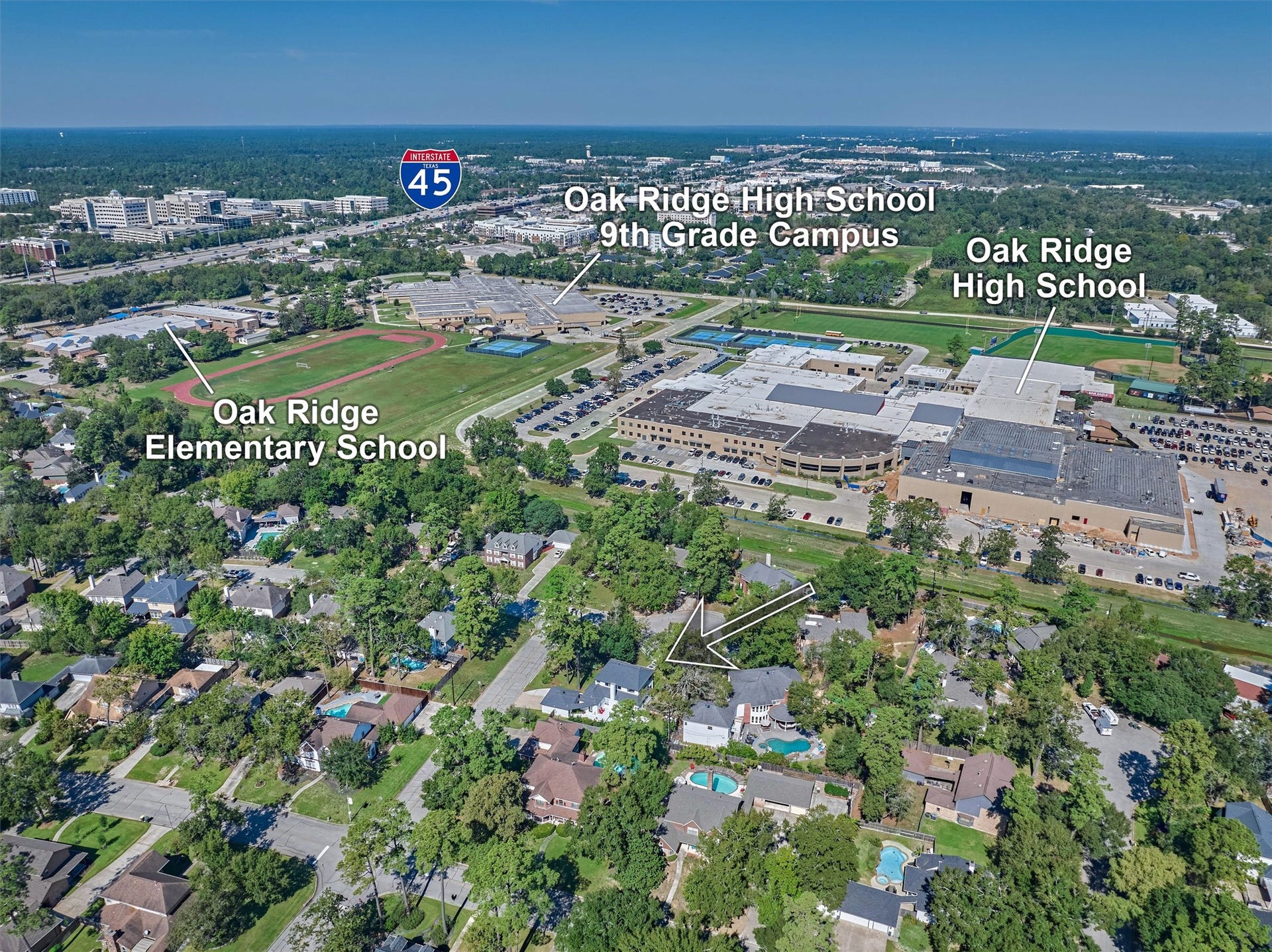 402 Susan Lane, Conroe, TX 77385 Aerial photo showcases proximity to nearby Oak Ridge schools.