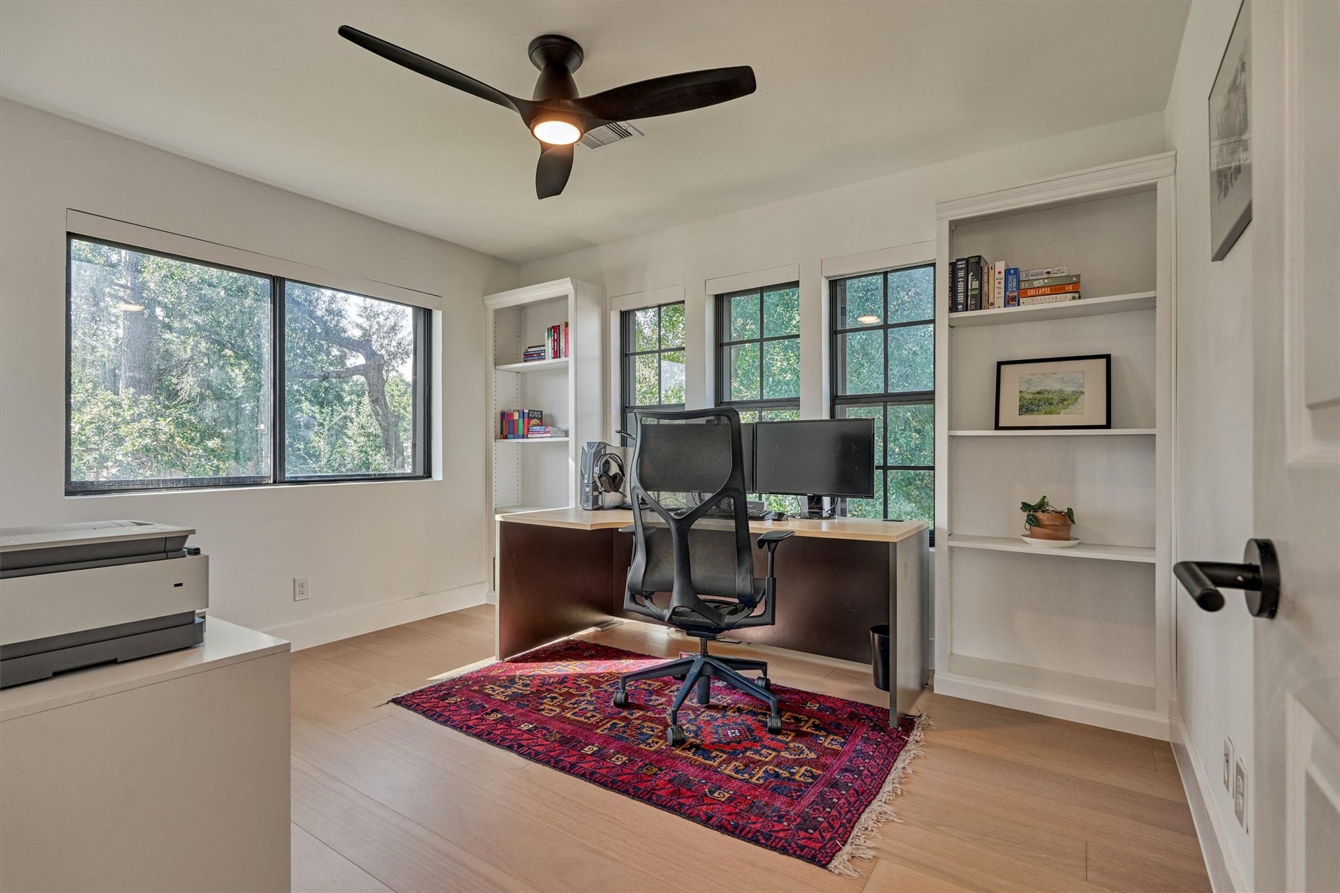 402 Susan Lane, Conroe, TX 77385 Bedroom 4 (optional office) features built-in bookshelves and tree top views!
