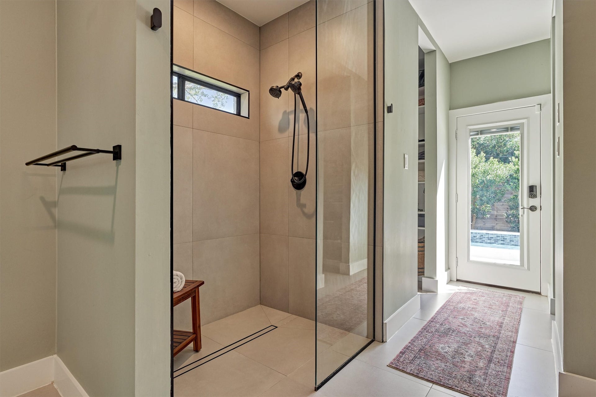 402 Susan Lane, Conroe, TX 77385 Spa-like bath is exceptional in design and this resort-like walk-in shower will make you feel like you are on vacation every day!