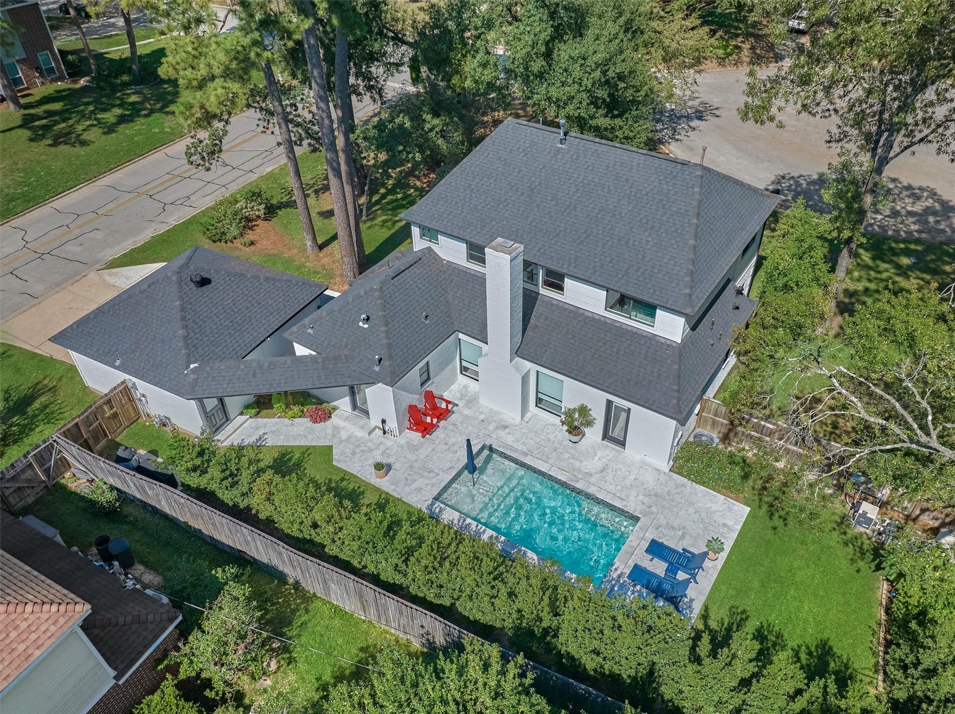 402 Susan Lane, Conroe, TX 77385 Wooded lot with resort style backyard on quiet corner in Oak Ridge North!