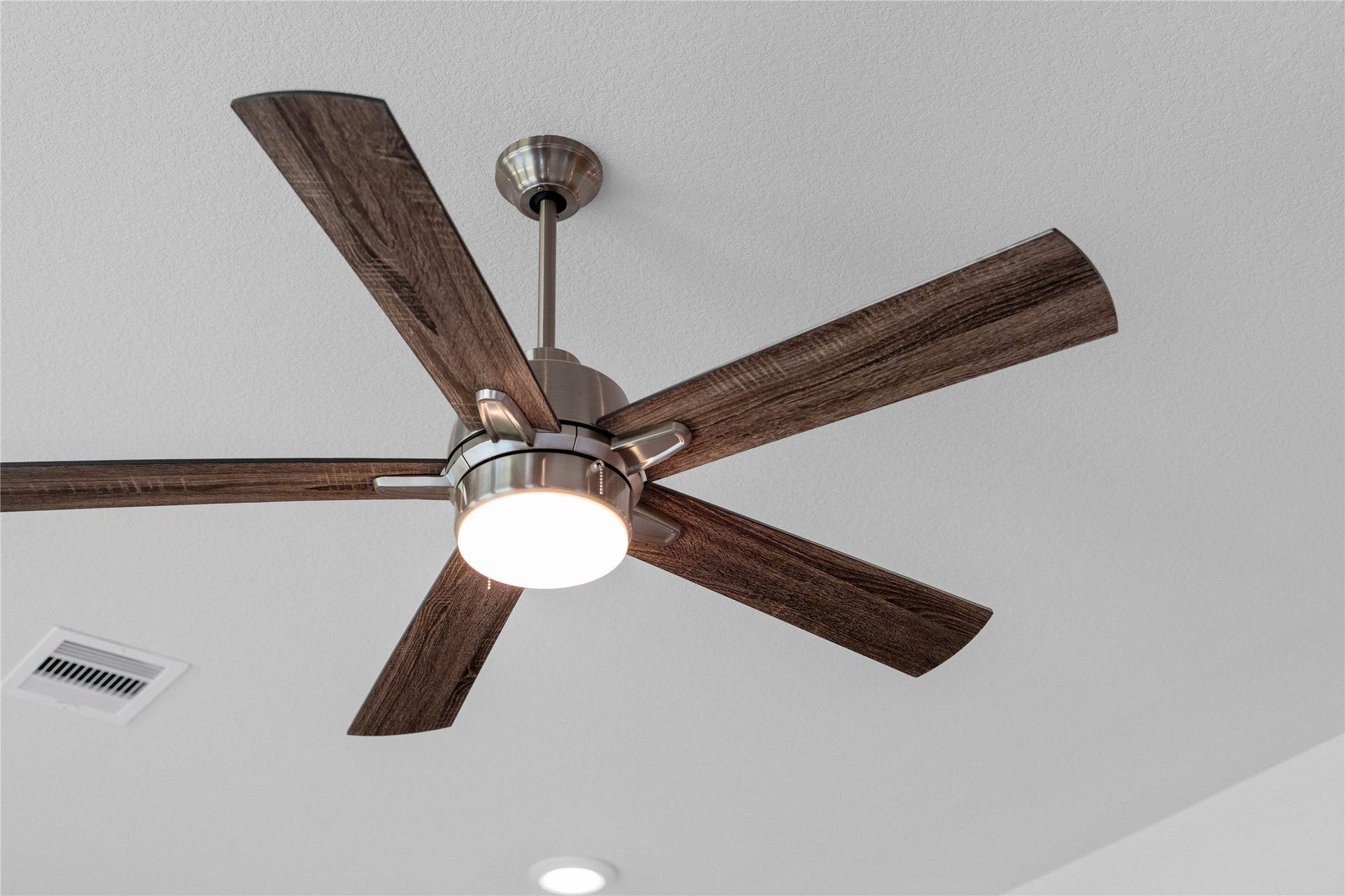 This fan offers a clean, modern aesthetic that complements contemporary decor. It is also an energy-efficient upgrade, helping to reduce energy costs and improve air circulation in both warm and cool months.