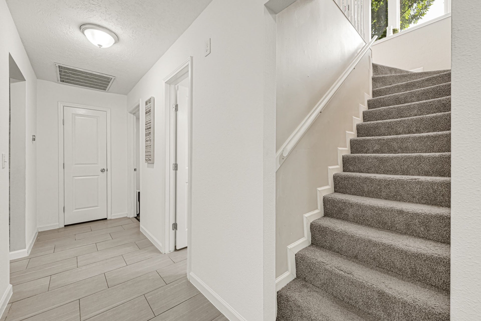 5343 Royal Parkway, Friendswood, TX 77546 Stairs lead to upstairs room with another full bathroom.