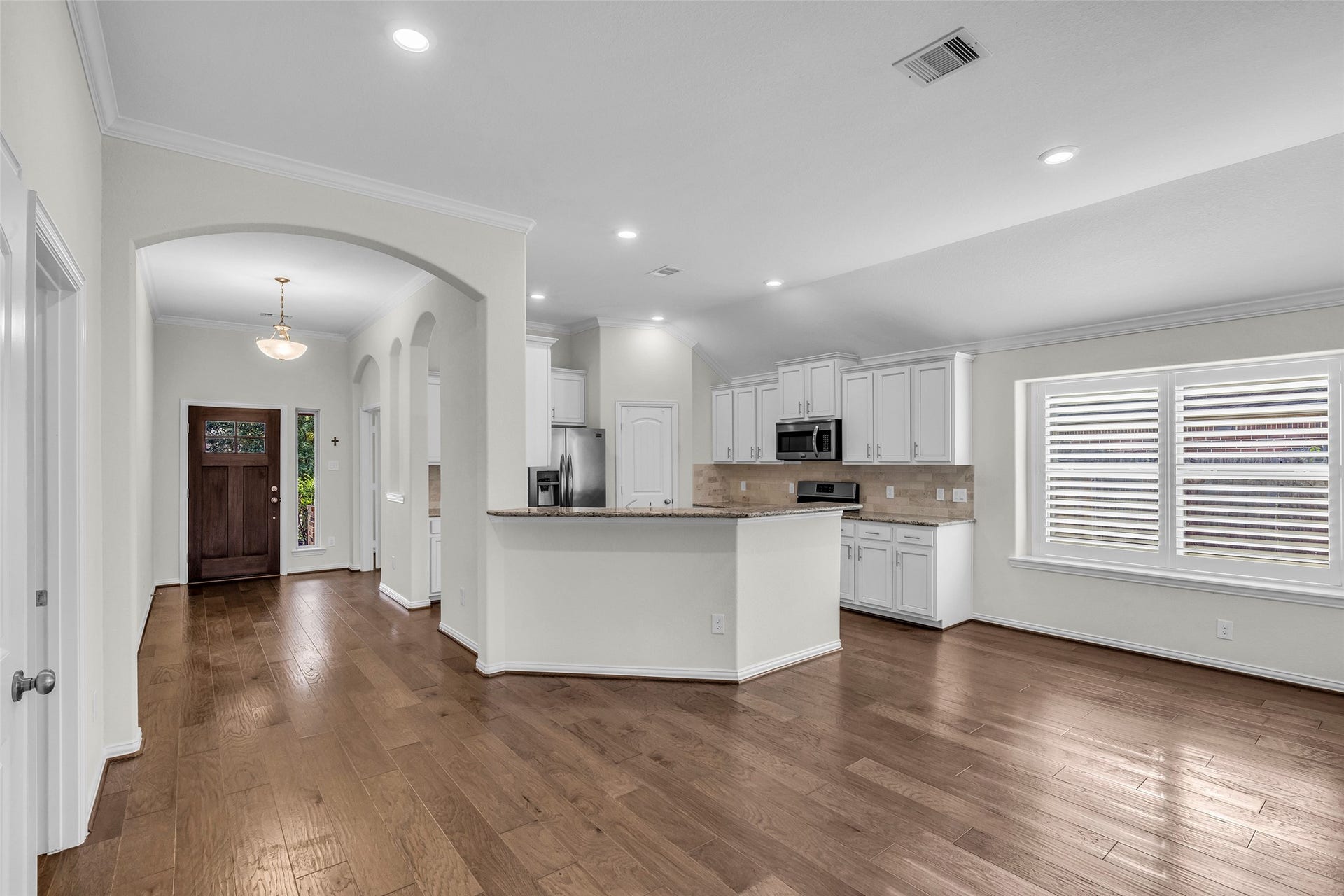 3870 Enchanted Timbers Lane, Spring, TX 77386 Kitchen is open to dining area and Living Room
