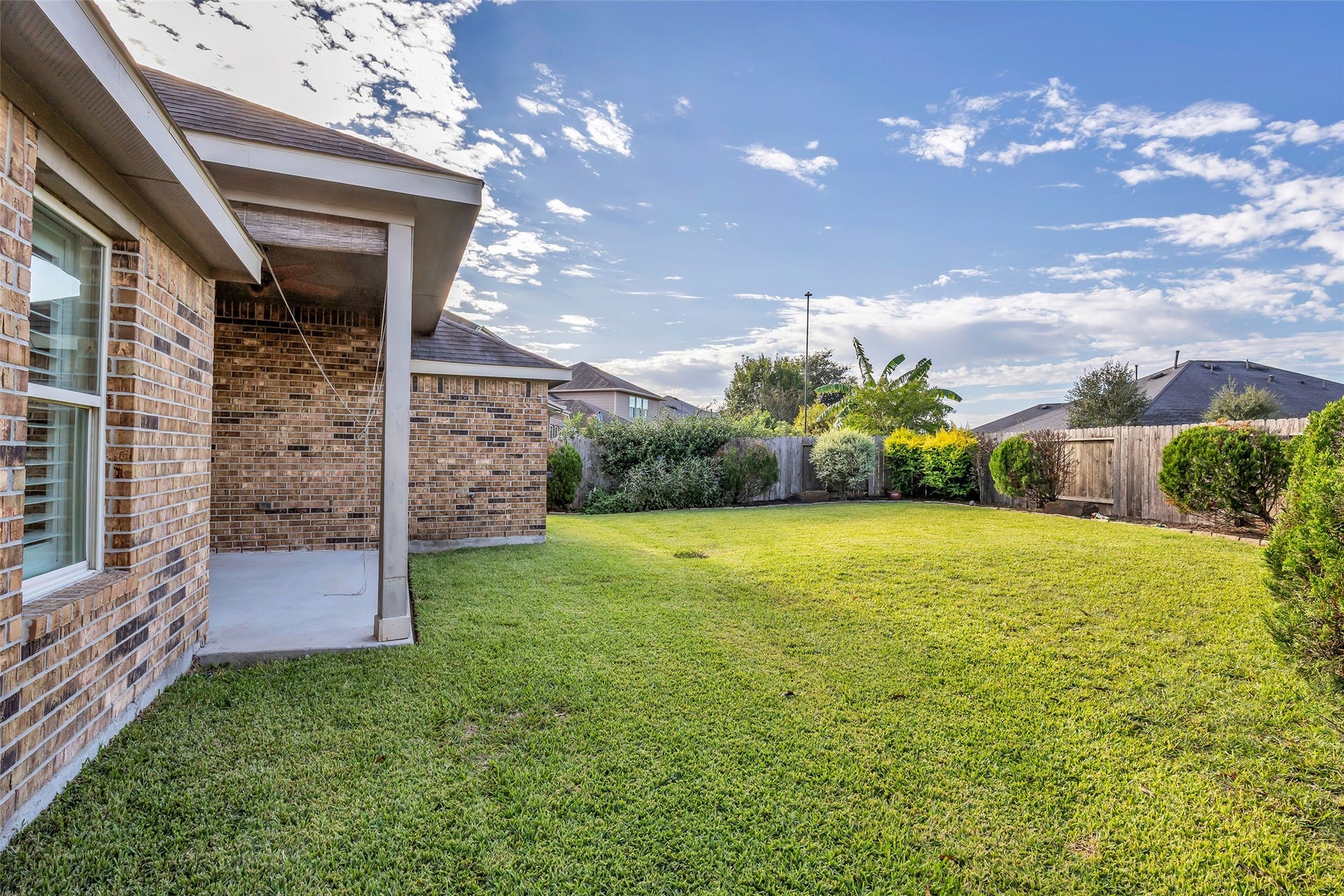 3870 Enchanted Timbers Lane, Spring, TX 77386 Landscaped Back Yard