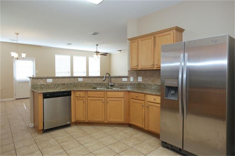 3126 Richland Spring Lane, Sugar Land, TX 77479 Kitchen with Refrigerator & Dishwasher