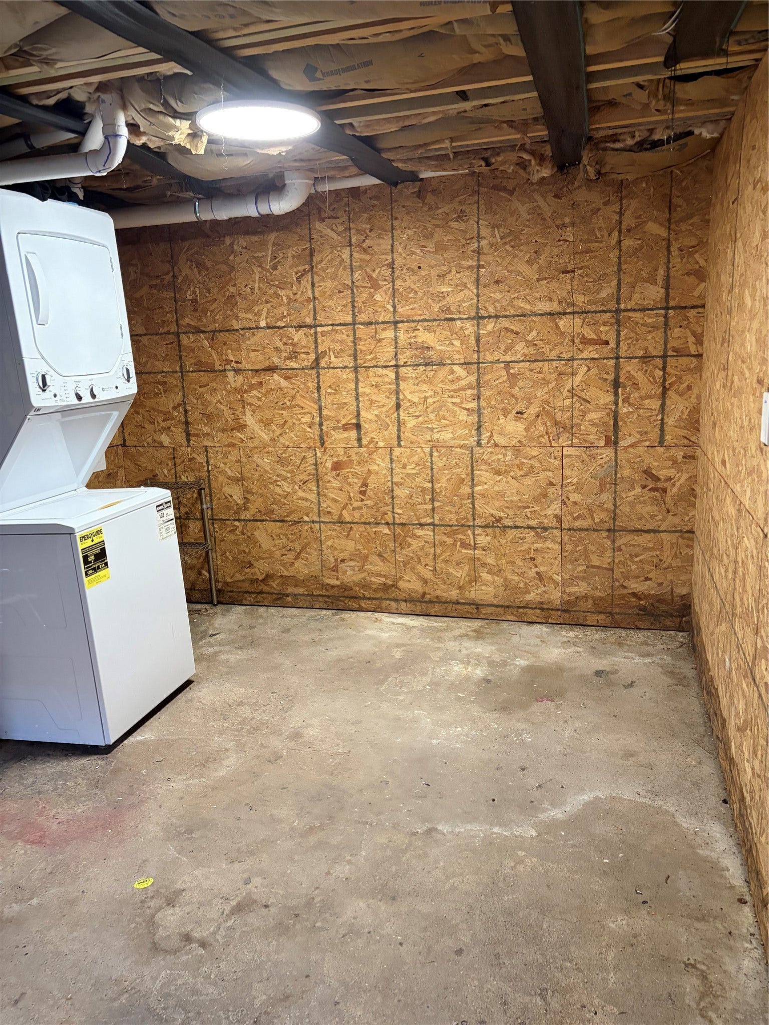 Storage side with stack washer/dryer