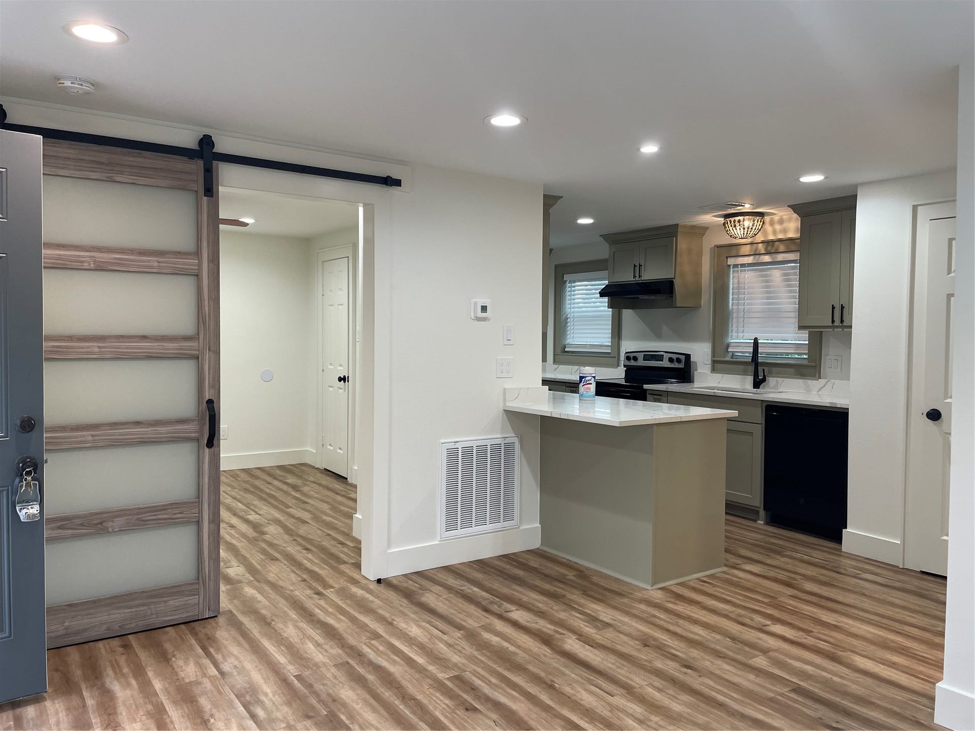 This view shows slider door into bedroom.