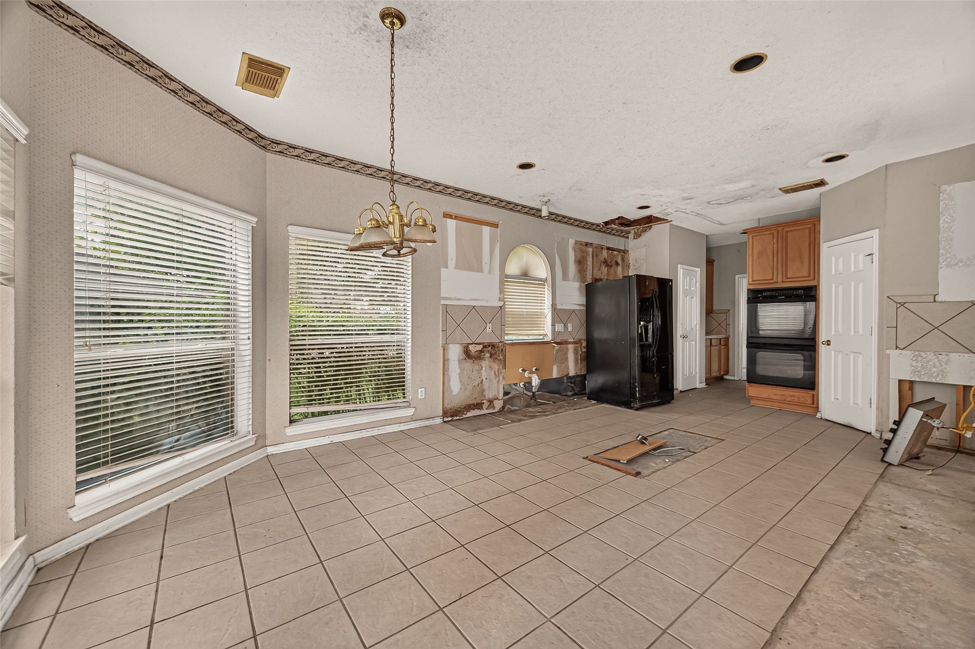 2602 Pinebend Drive, Pearland, TX 77584 Another look at this kitchen which features double ovens, a deep pantry, and a butlers pantry connecting to the formal dining room
