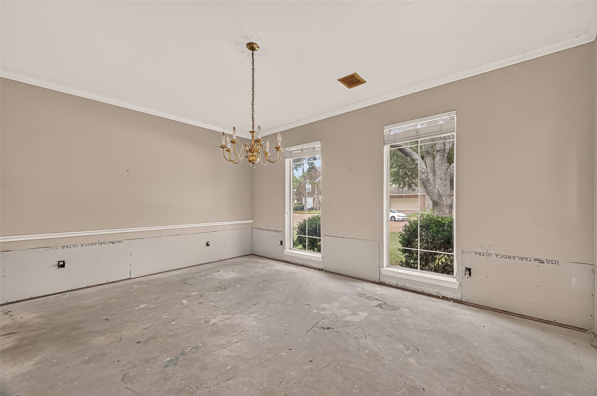 2602 Pinebend Drive, Pearland, TX 77584 Host unforgettable dinner parties in this stately formal dining room, framed by large windows overlooking the manicured front lawn.