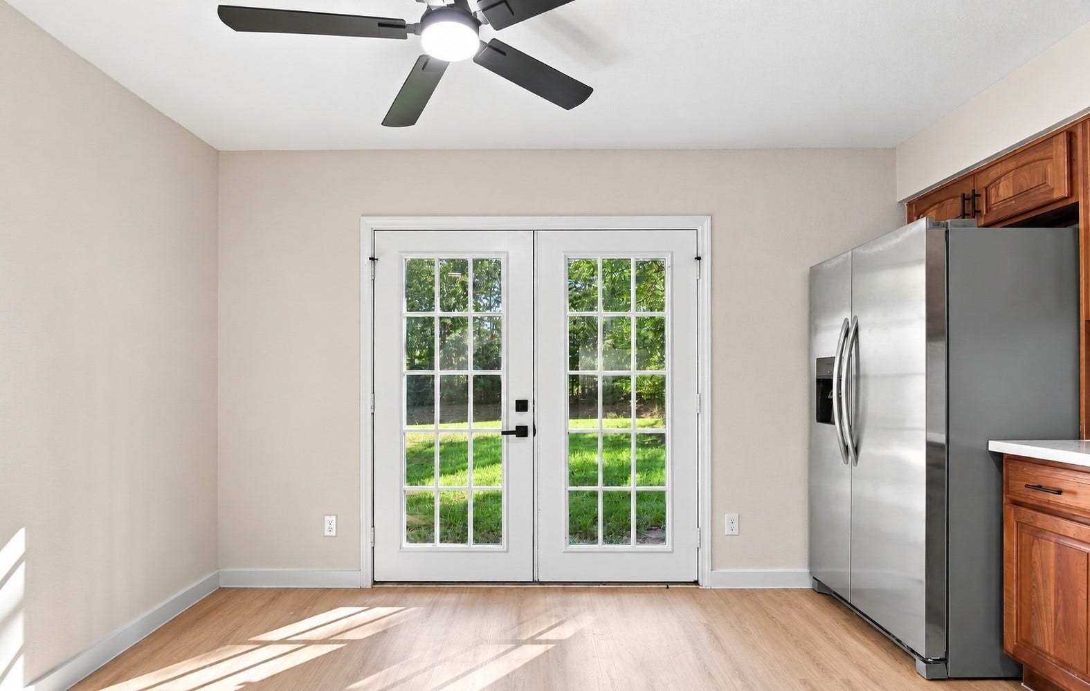 16714 Camber Court, Crosby, TX 77523 An angle of the dining room with a brand-new sliding door!