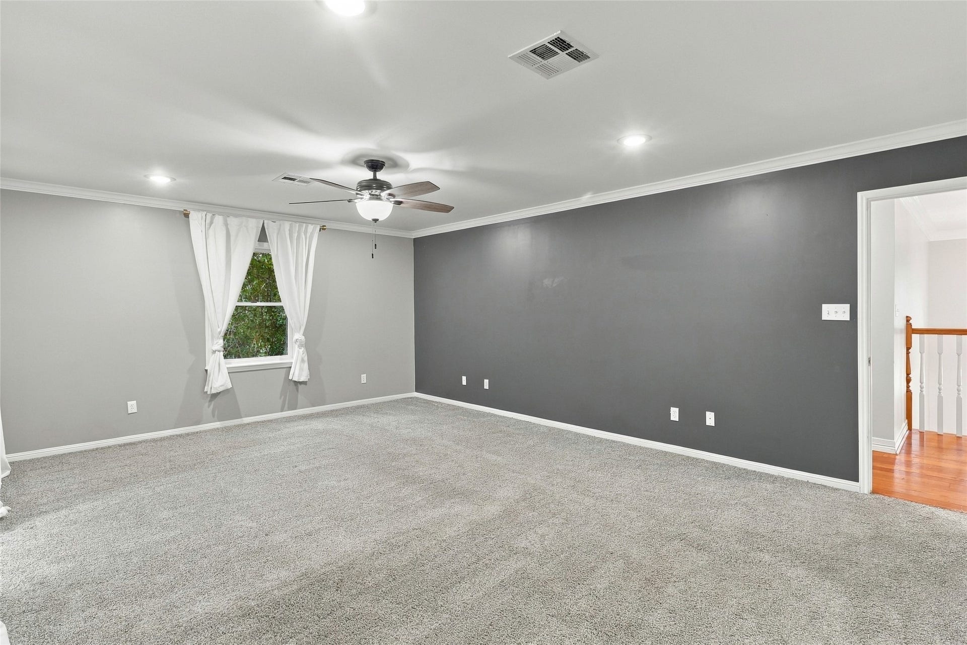 8714 Holly Hills Drive, Tomball, TX 77375 You will love this inviting, light-filled primary bedroom designed as a spacious retreat.