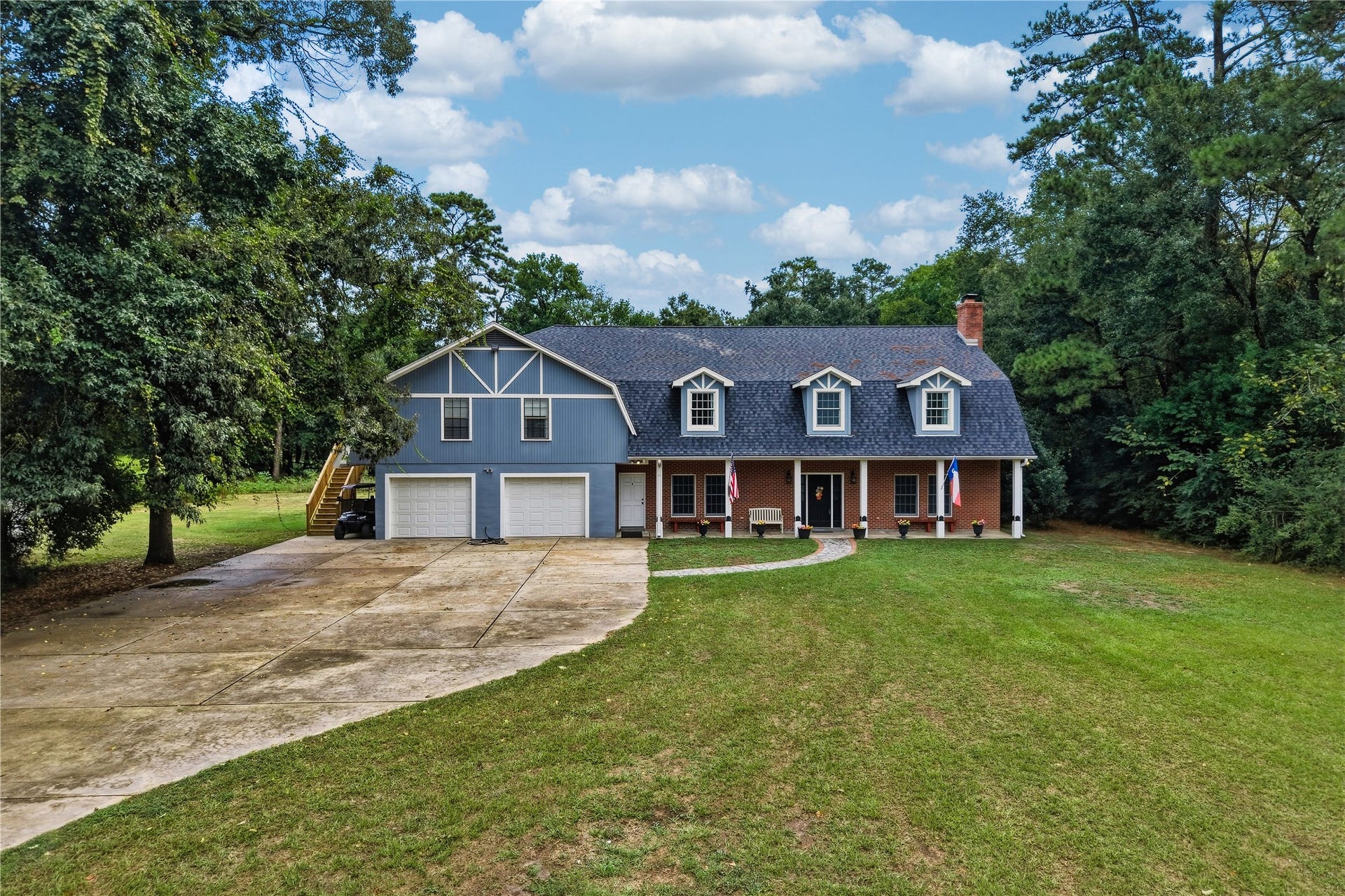 8714 Holly Hills Drive, Tomball, TX 77375 Enjoy peaceful country living on this beautiful, sprawling two-acre property.