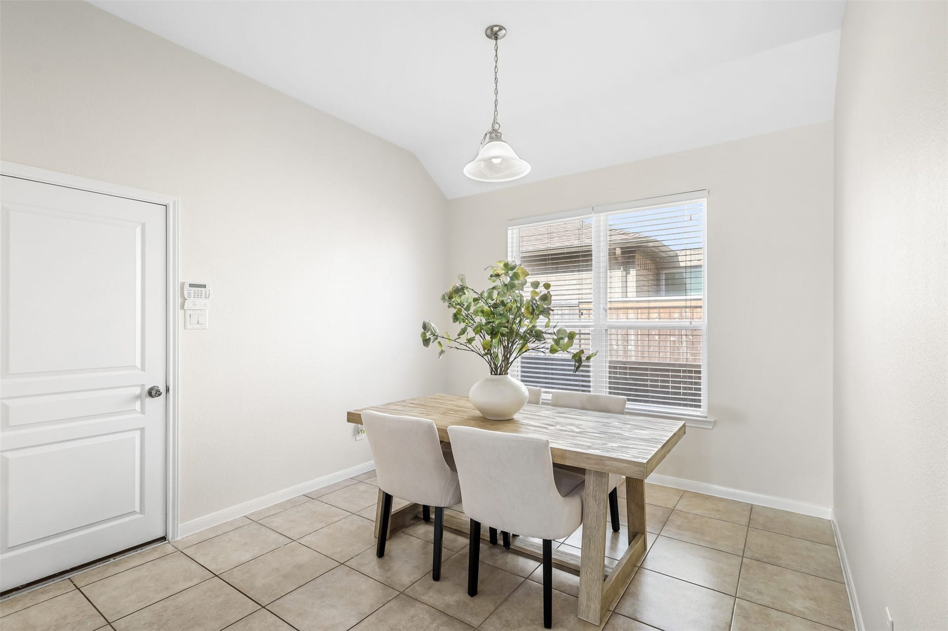 9731 Carina Forest Court, Humble, TX 77396 Just beyond the kitchen, the breakfast area offers a bright and comfortable place for everyday meals. A large window fills the space with natural light and provides a pleasant backdrop for morning coffee or a quick family breakfast.