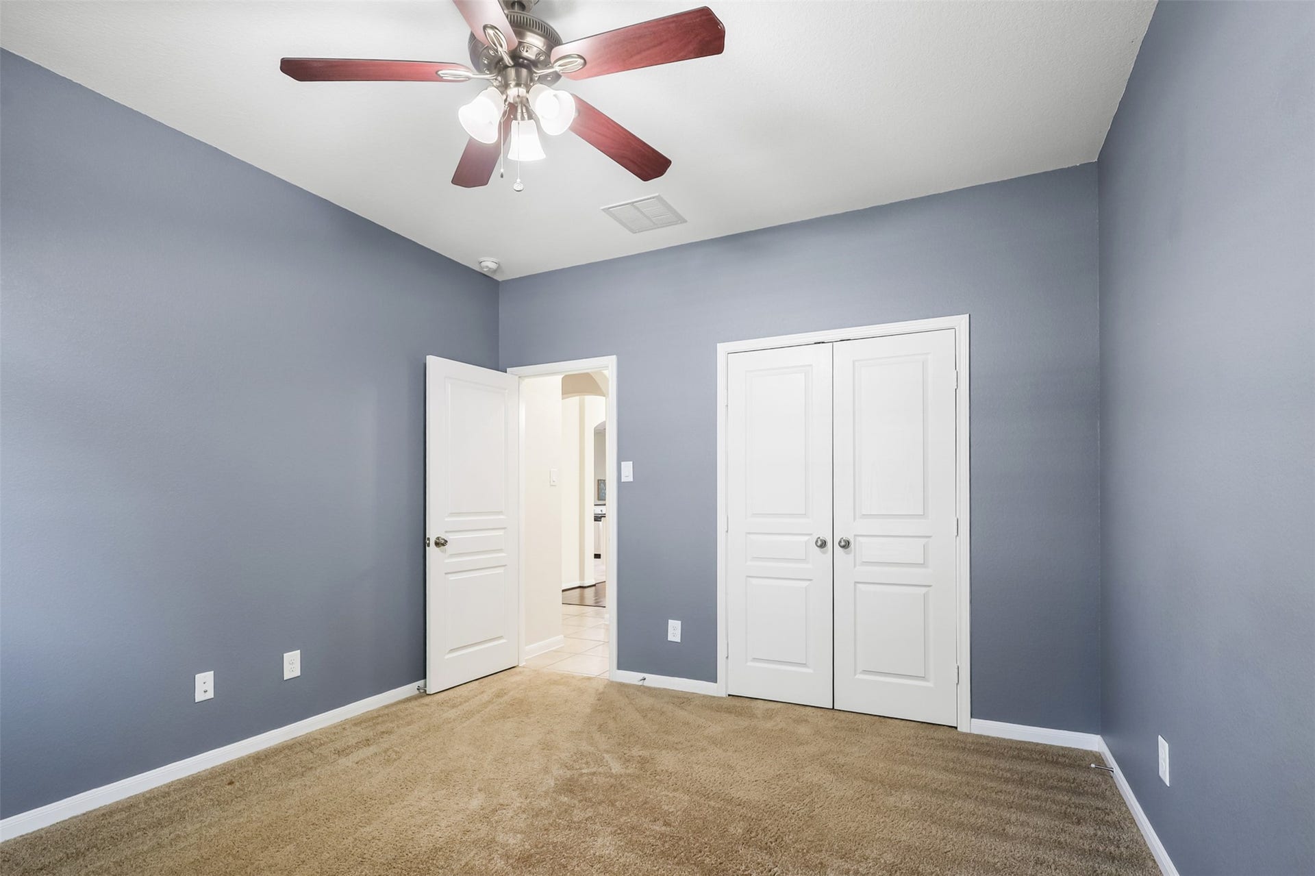 9731 Carina Forest Court, Humble, TX 77396 This bedroom is located at the front of the home and offers a full bath across the hall. Great as a mother in law suite.